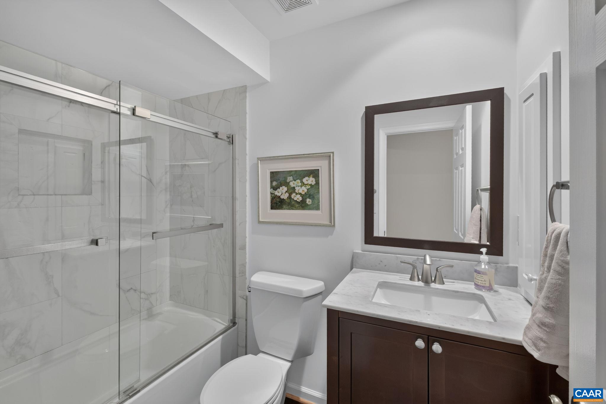 Newly refreshed upstairs hall bathroom.