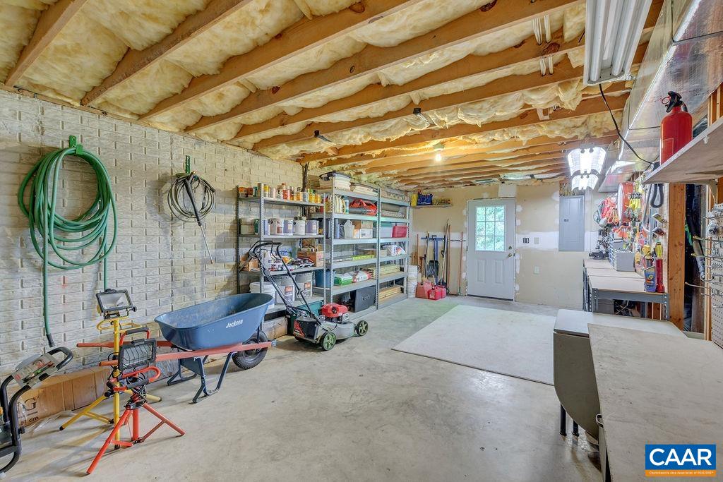 Workshop/storage area with outside access. Terrace level also plumbed for another bathroom.