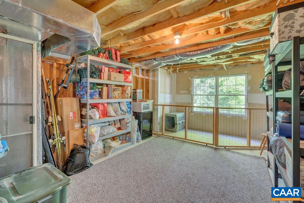 Storage room with a pet area.
