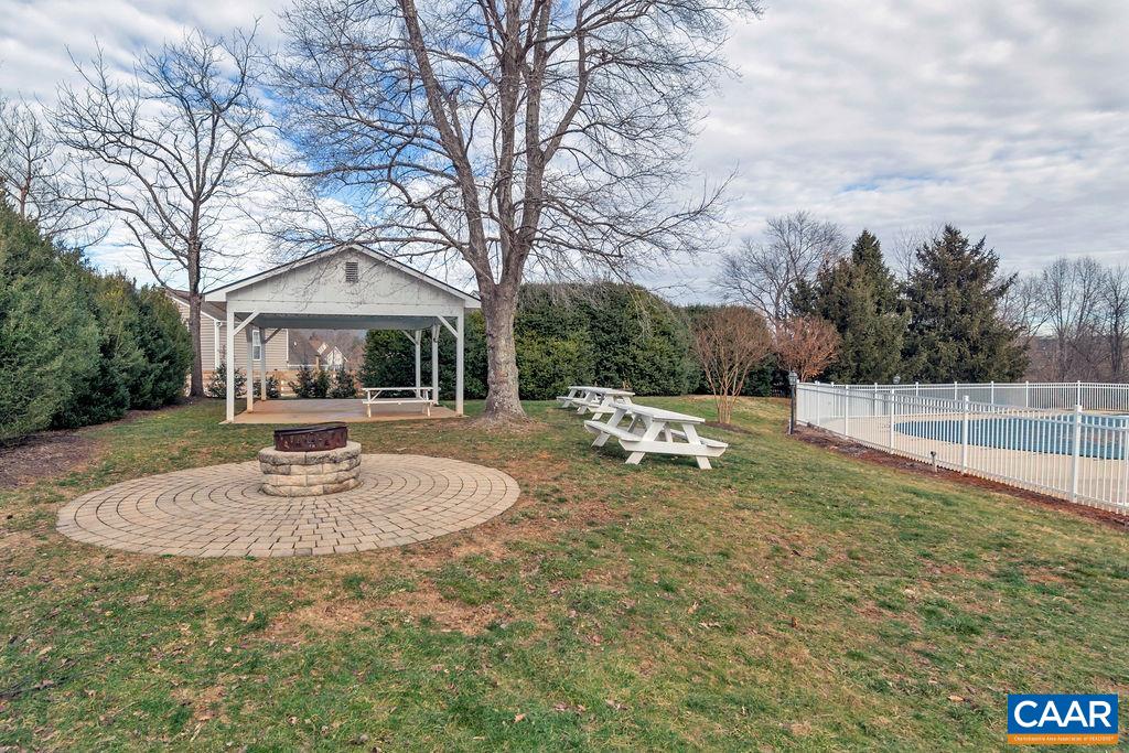 Firepit, picnic tables and pavillion.