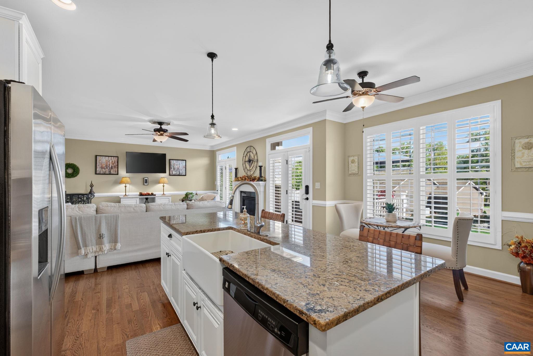 Farm sink, white cabinets and stainless steel appliances. Farm sink, white cabinets and stainless steel appliances.
