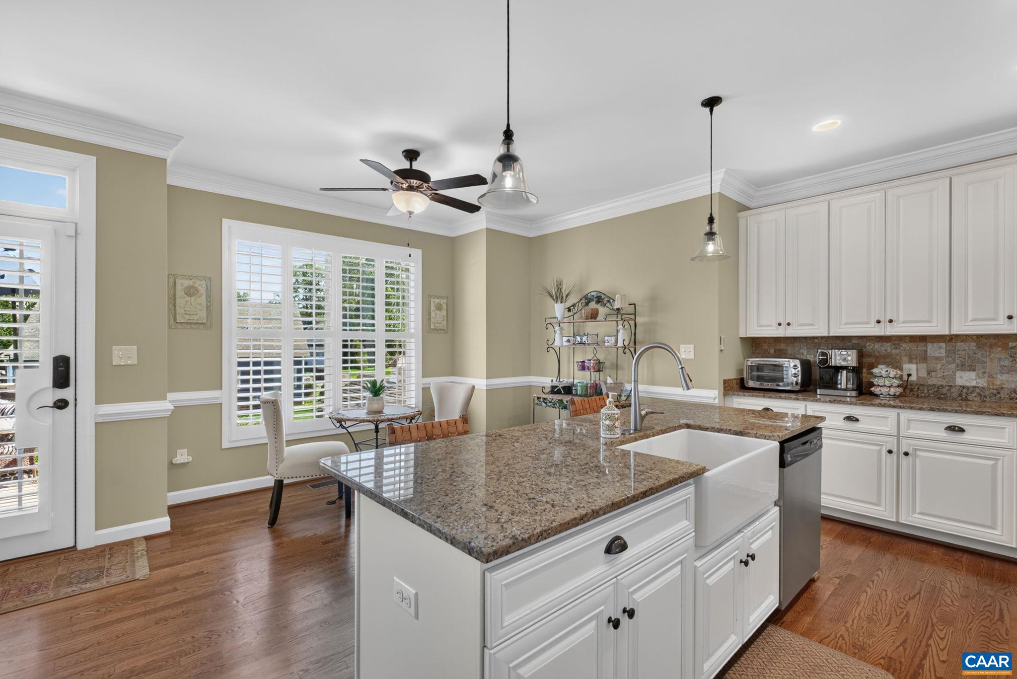 Granite countertops, tile surround, and pendant lights! Granite countertops, tile surround, and pendant lights!