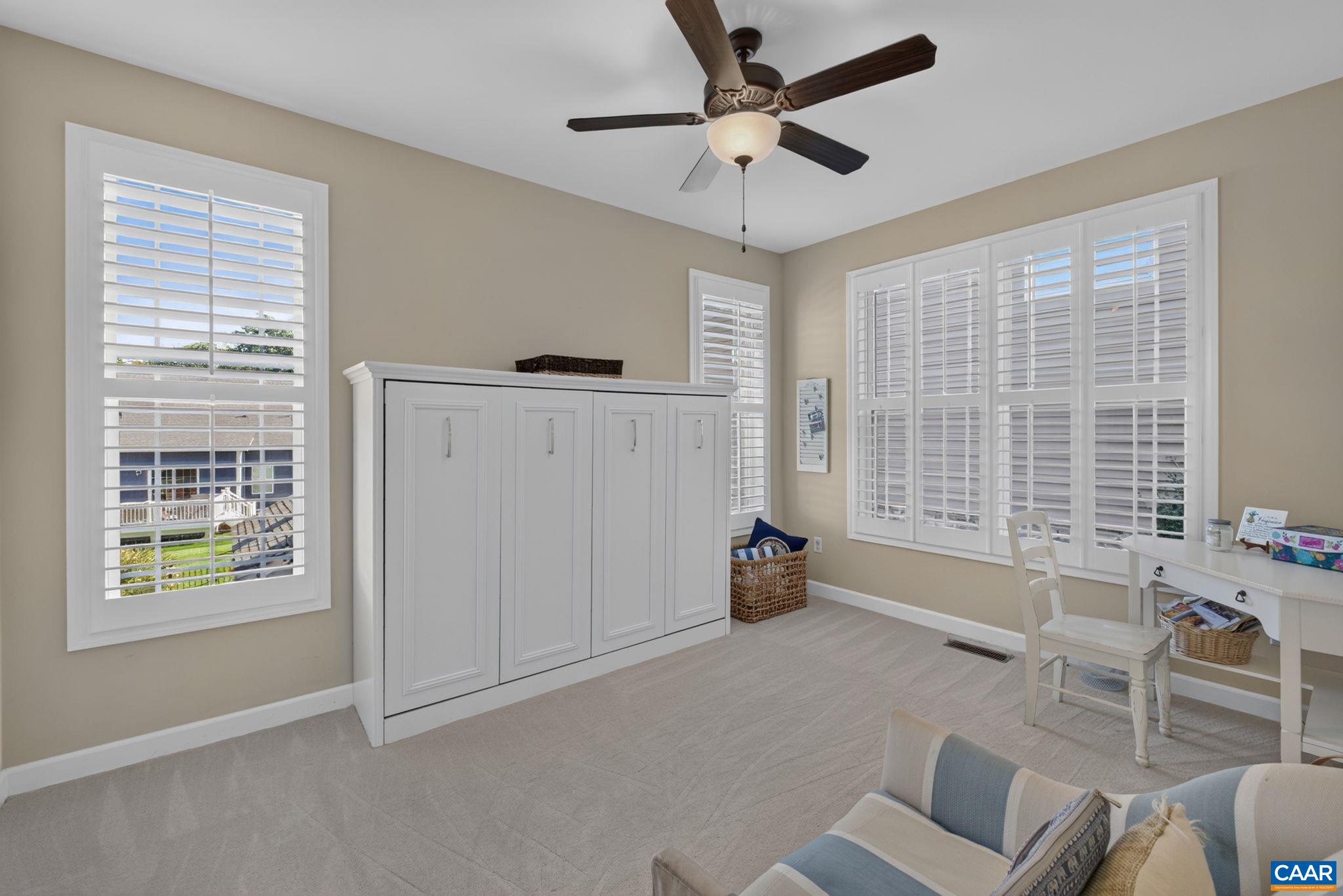 Bedroom 3- The murphy bed (double size) conveys and allows this room to be a possible office. Bedroom 3- The murphy bed (double size) conveys and allows this room to be a possible office.
