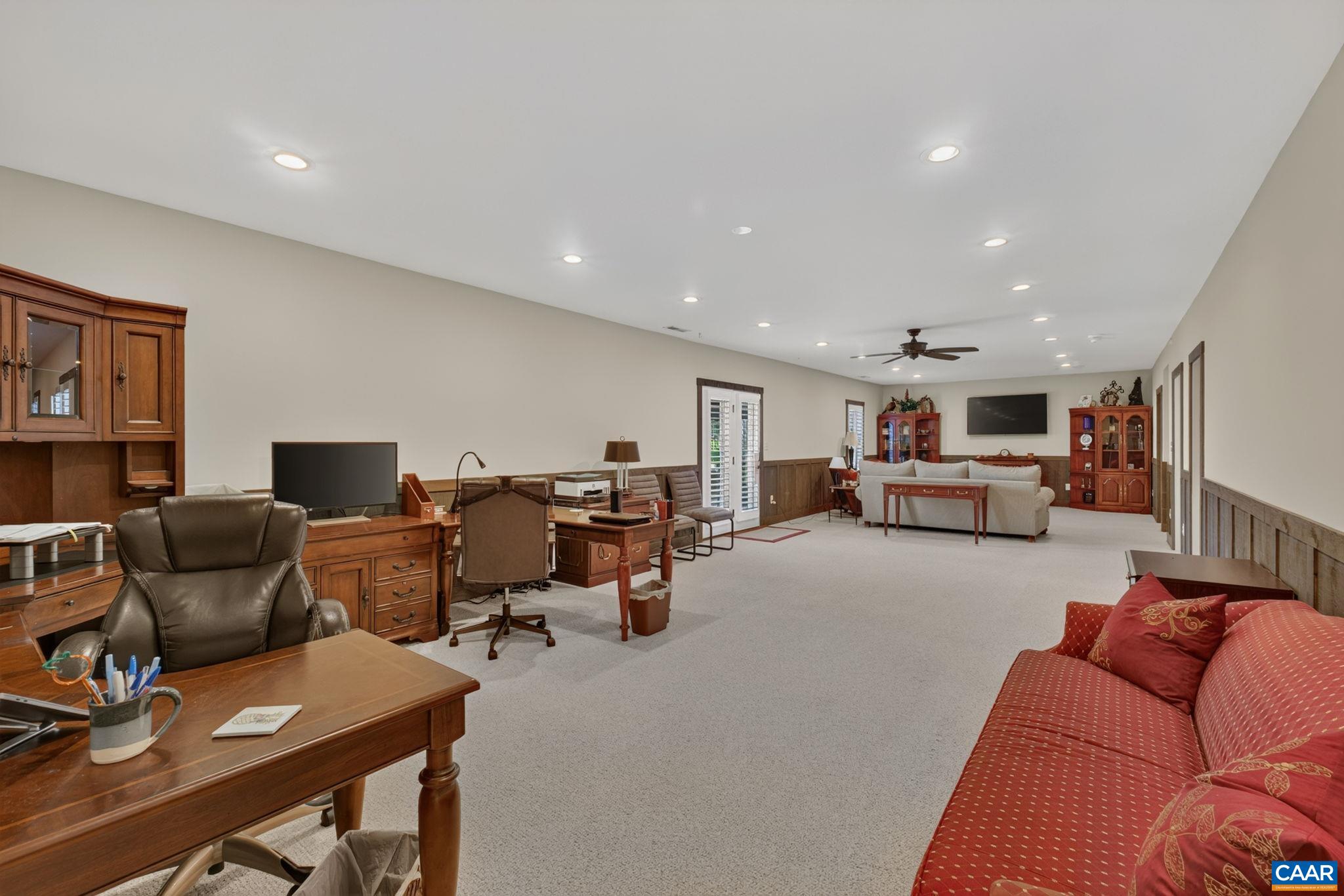 Have your rec room/ home theatre in one section, and a large home office/work space at the opposite end! Have your rec room/ home theatre in one section, and a large home office/work space at the opposite end!