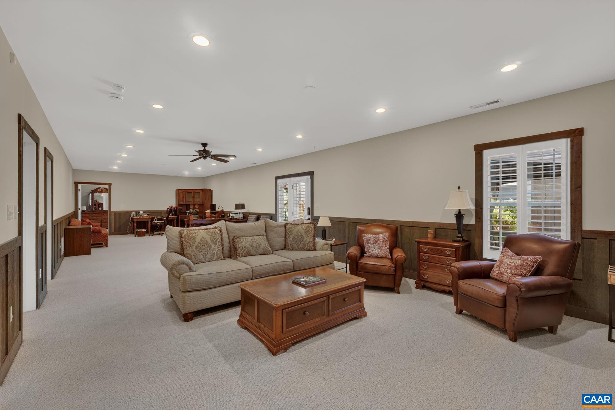 Walkout to an extensive outdoor living space! No shortcuts on lighting! Recessed lighting, and ceiling fans are everywhere!! Walkout to an extensive outdoor living space! No shortcuts on lighting! Recessed lighting, and ceiling fans are everywhere!!
