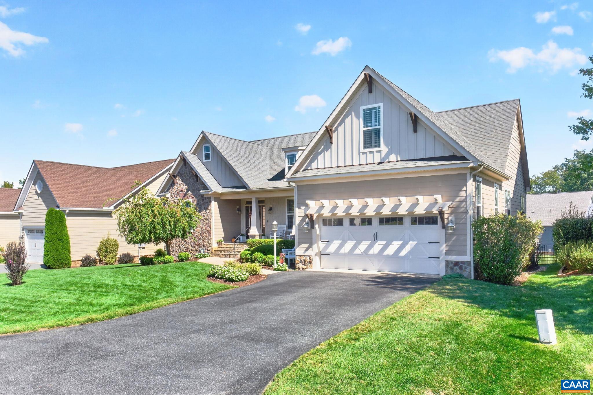 The nearly level yard and driveway lead to this spacious main-level living home! The nearly level yard and driveway lead to this spacious main-level living home!