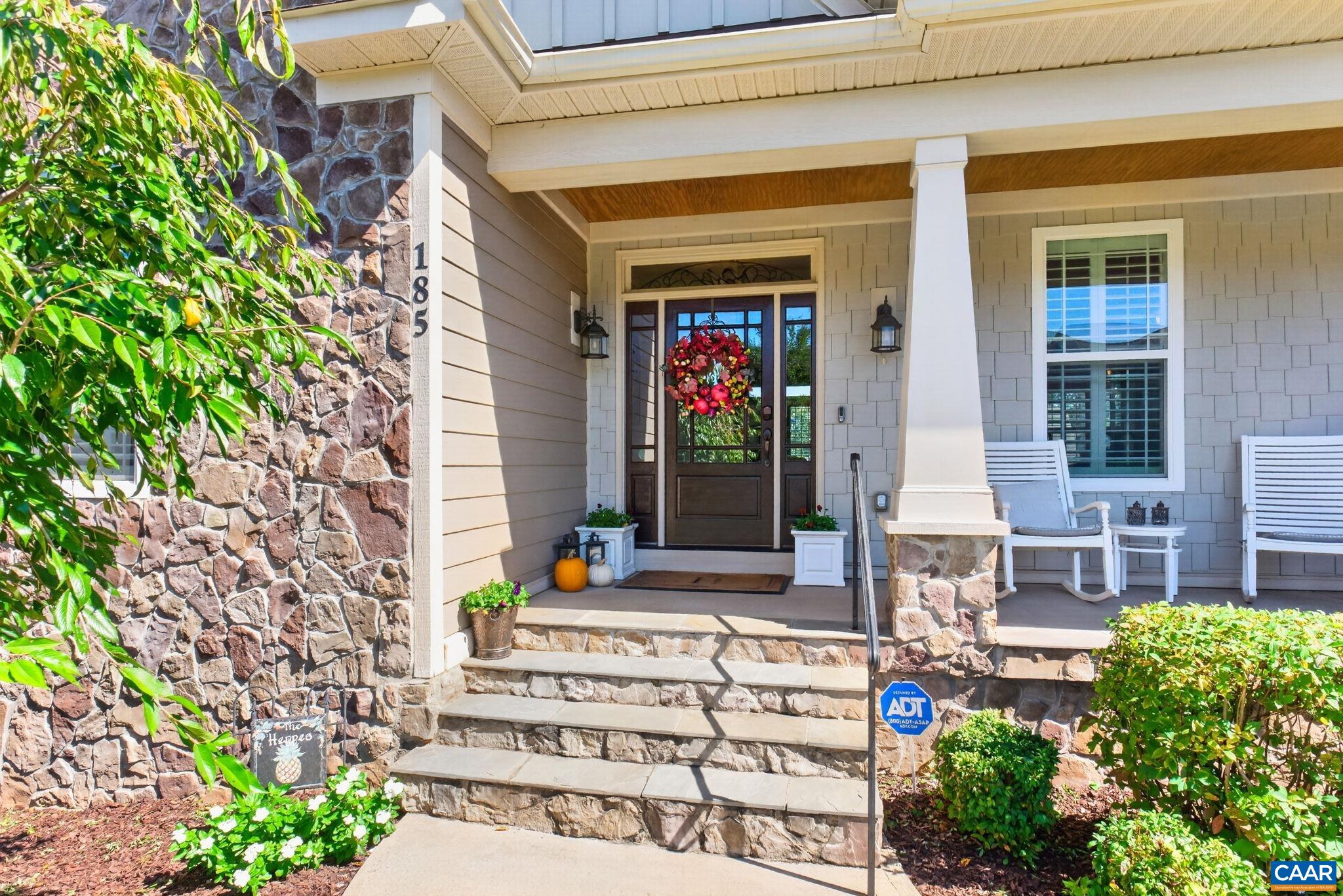 Exterior arts and crafts details include the beautiful stone facing, and welcoming front porch featuring a blue stone surround. Exterior arts and crafts details include the beautiful stone facing, and welcoming front porch featuring a blue stone surround.