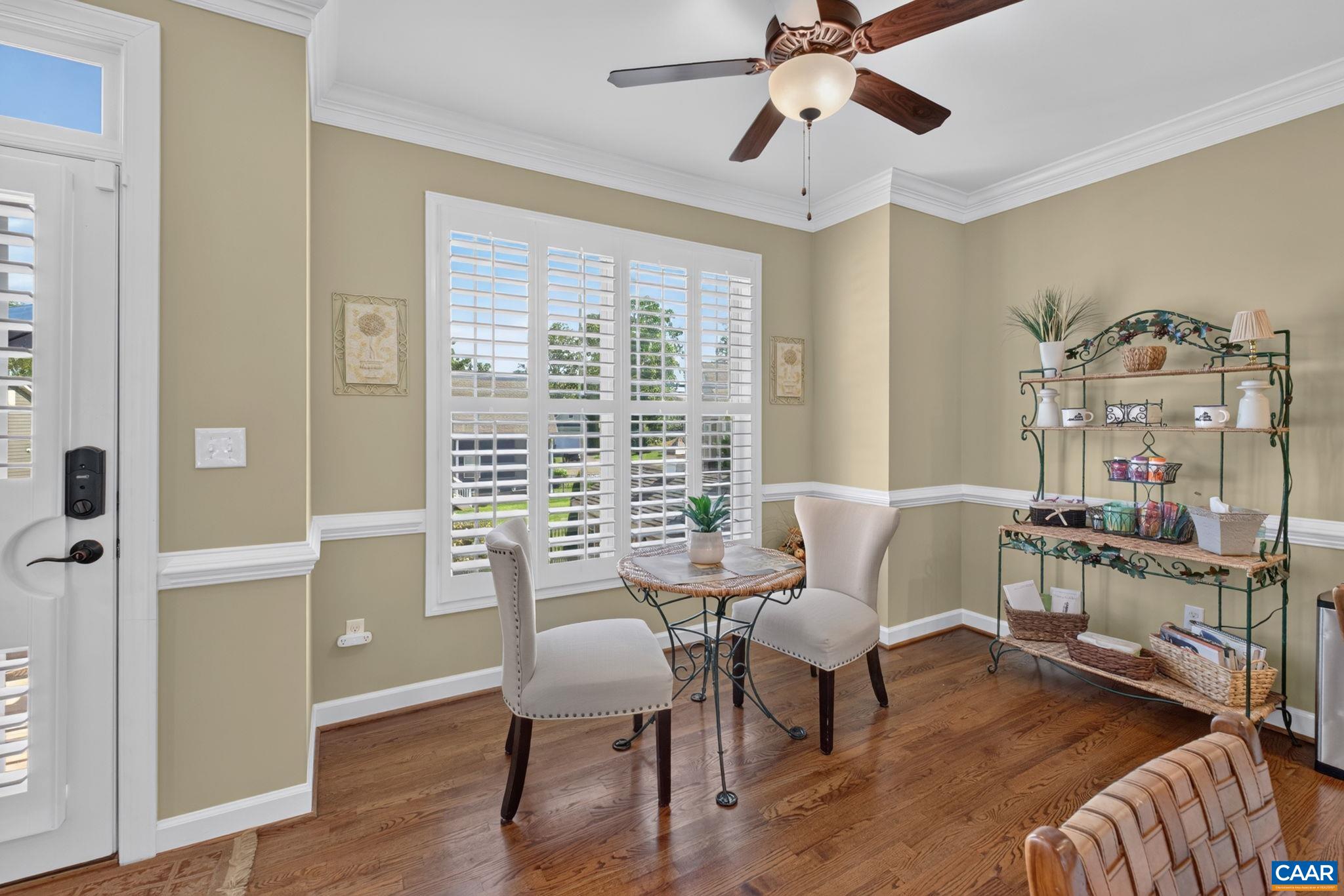 Lovely breakfast nook. Note the extensive crown molding, chair rail, and hardwood flooring in the main living spaces. Lovely breakfast nook. Note the extensive crown molding, chair rail, and hardwood flooring in the main living spaces.