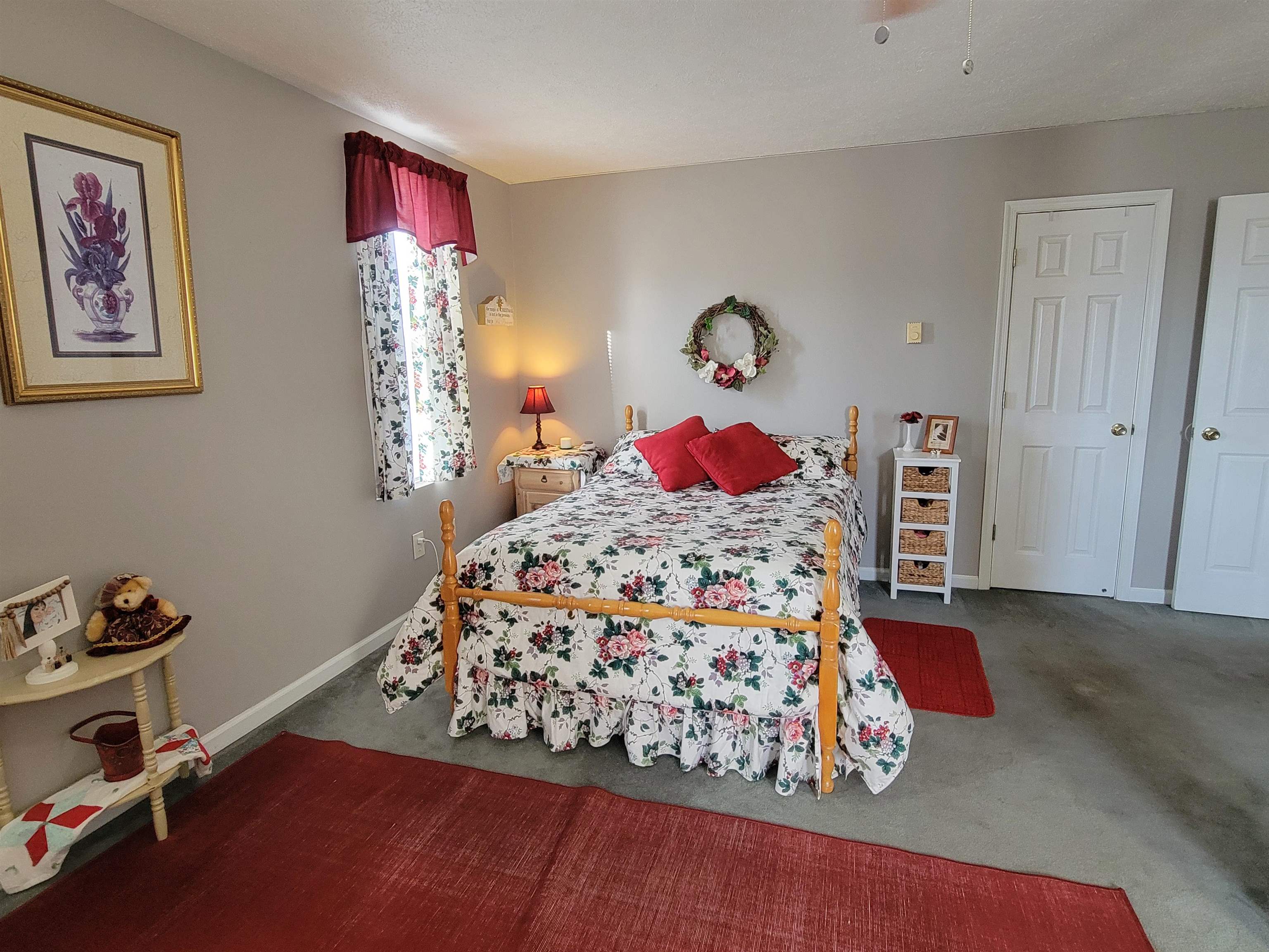 Bedroom includes bathroom suite and walk-in closet