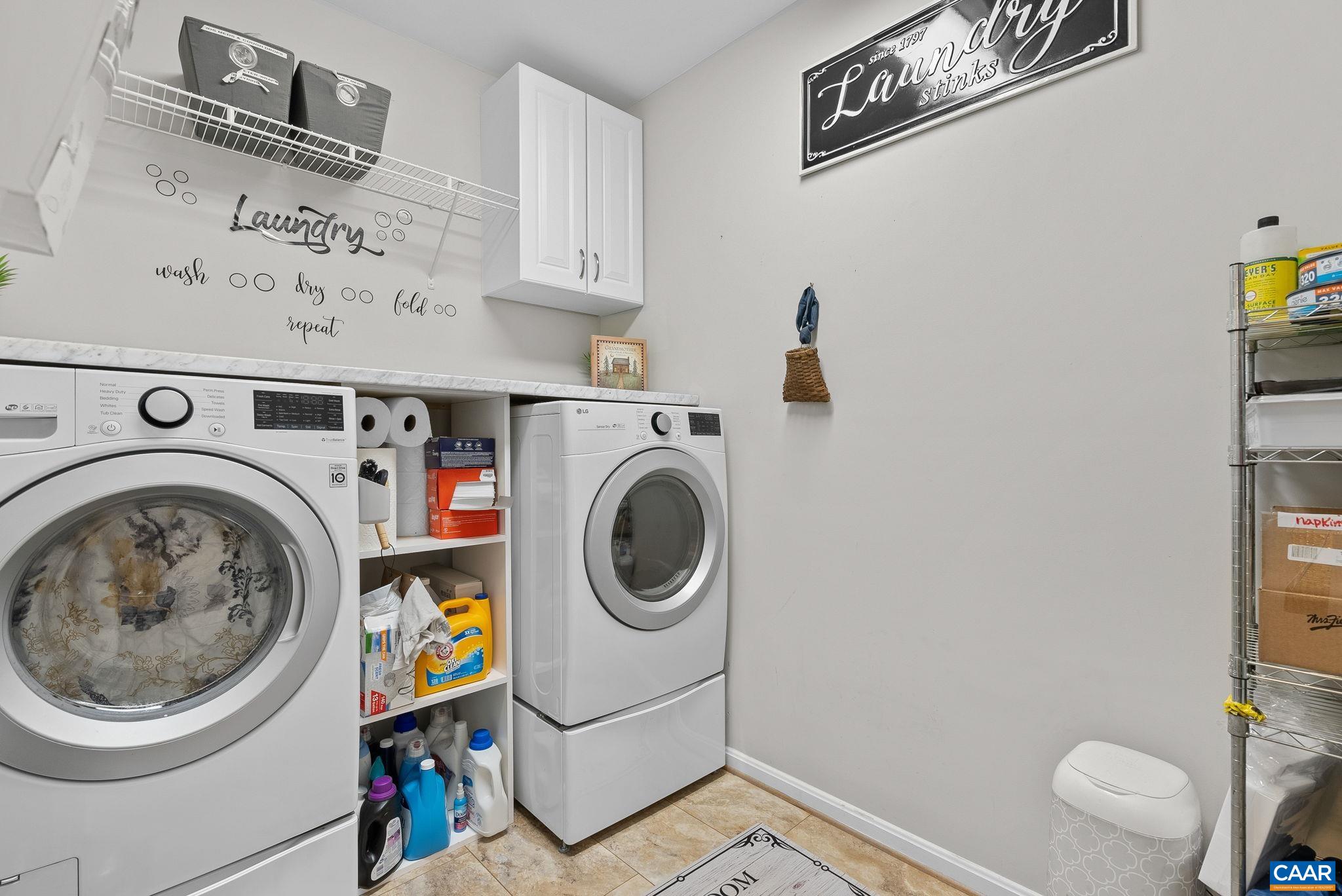 Front load washer and dryer in this very large Laundry room. Front load washer and dryer in this very large Laundry room.