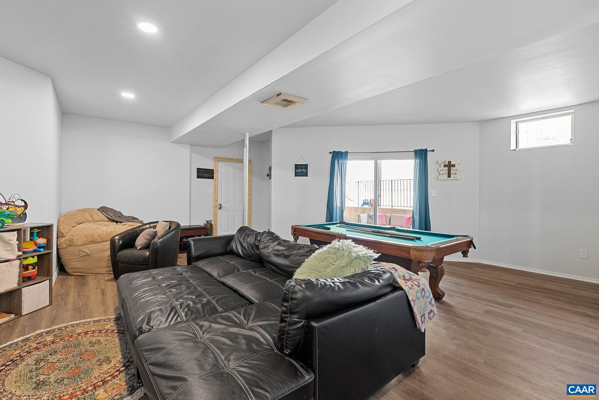Plenty of room for gatherings, or In law suite with full finished walk out basement with plenty of natural light. Plenty of room for gatherings, or In law suite with full finished walk out basement with plenty of natural light.