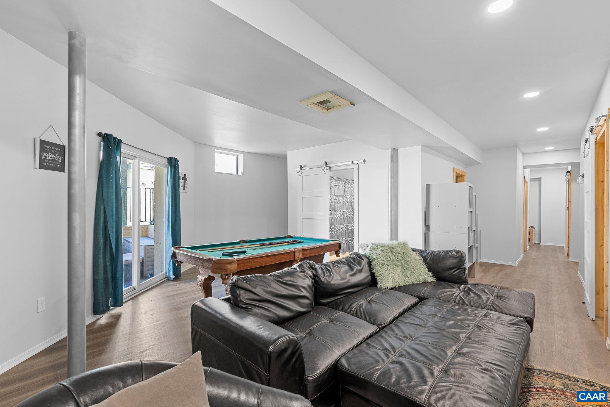 Newly finished full walk out basement, With Luxury Plank vinyl, full bathroom, plenty of additional storage. Newly finished full walk out basement, With Luxury Plank vinyl, full bathroom, plenty of additional storage.