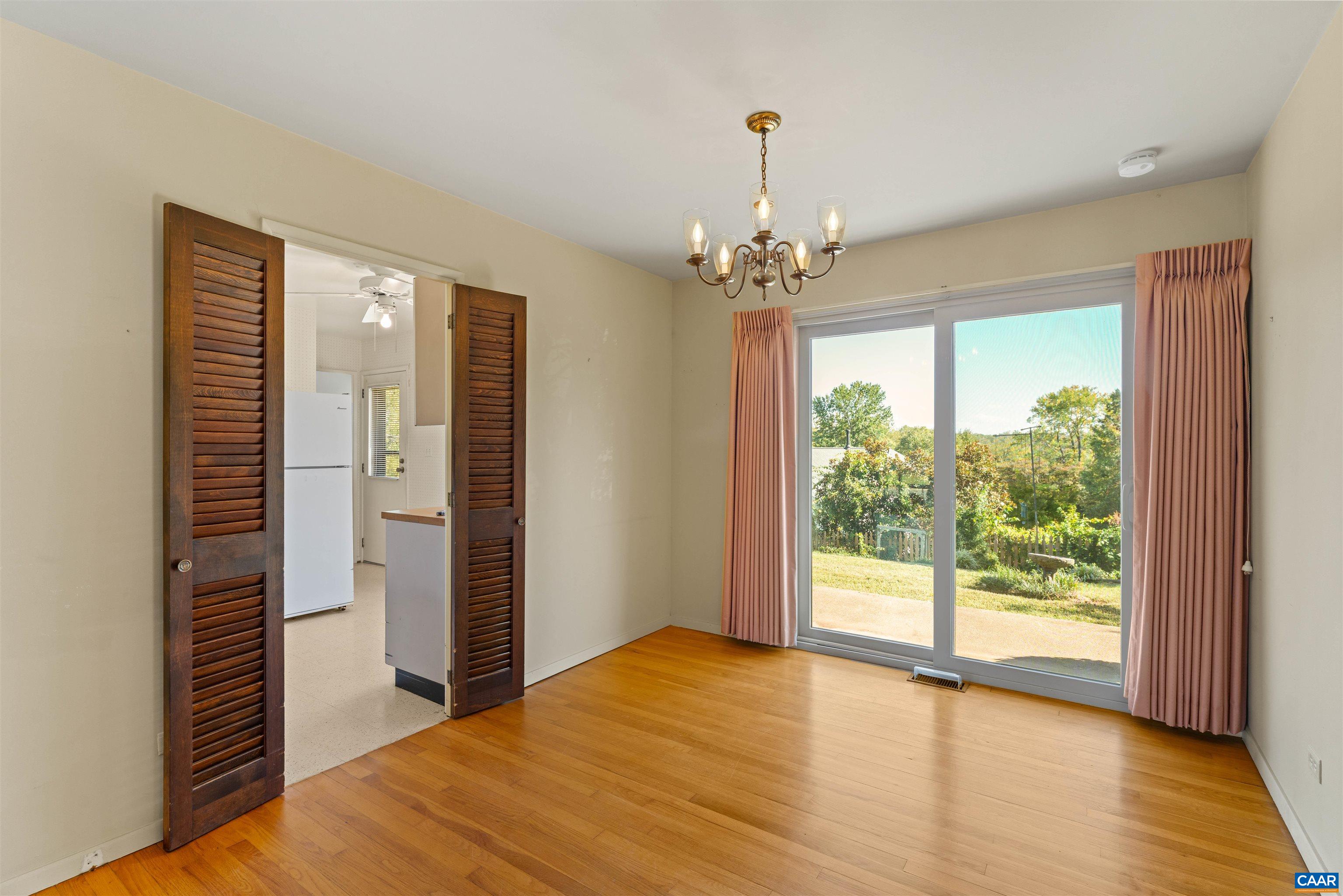Sliding door leads to rear porch