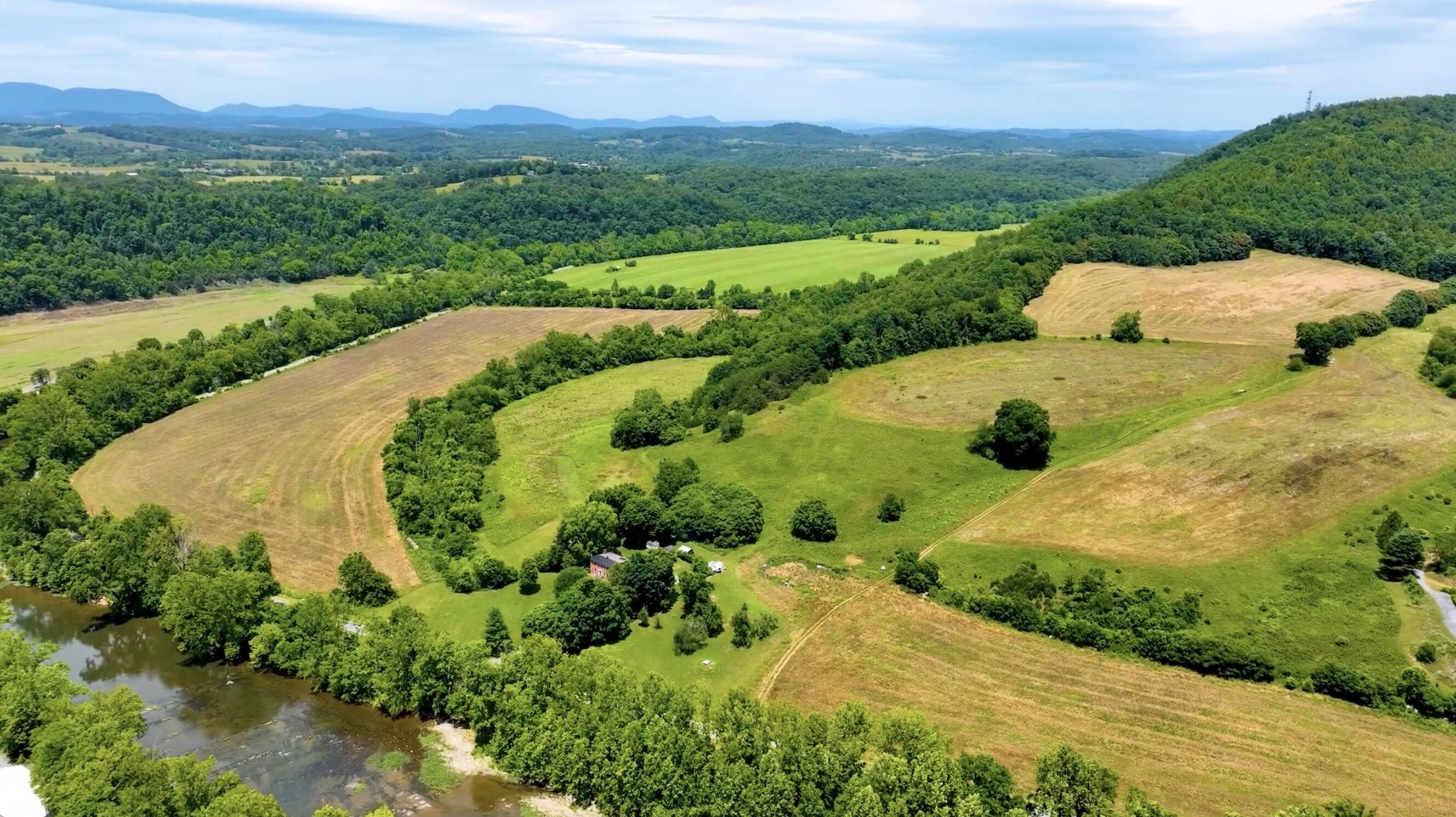 Private and lush, this acreage can support a variety of uses, including farming on the lower portions. Private and lush, this acreage can support a variety of uses, including farming on the lower portions.