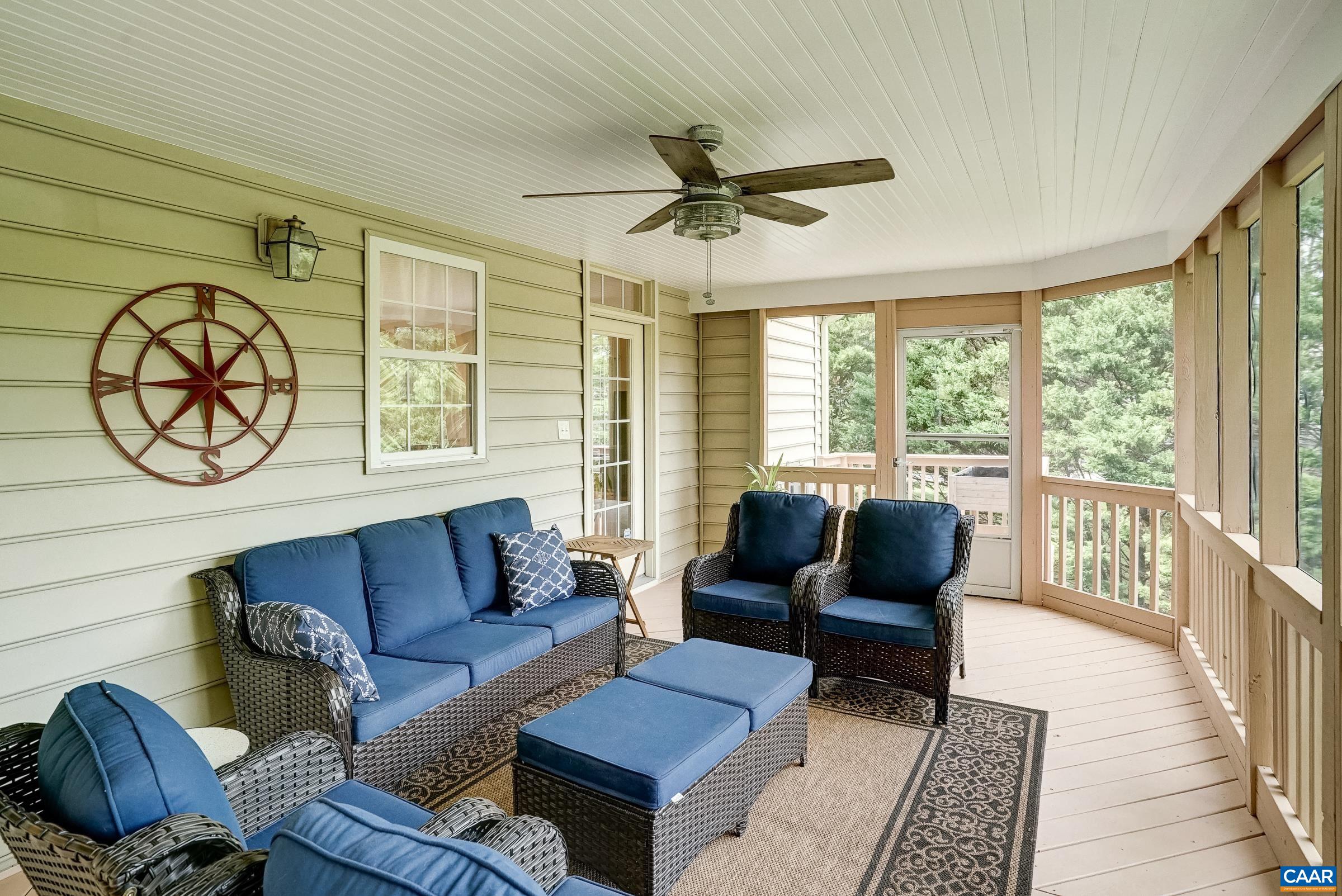 Enjoy outdoor dining and entertaining on the private screened in porch surrounded by mature trees. Enjoy outdoor dining and entertaining on the private screened in porch surrounded by mature trees.