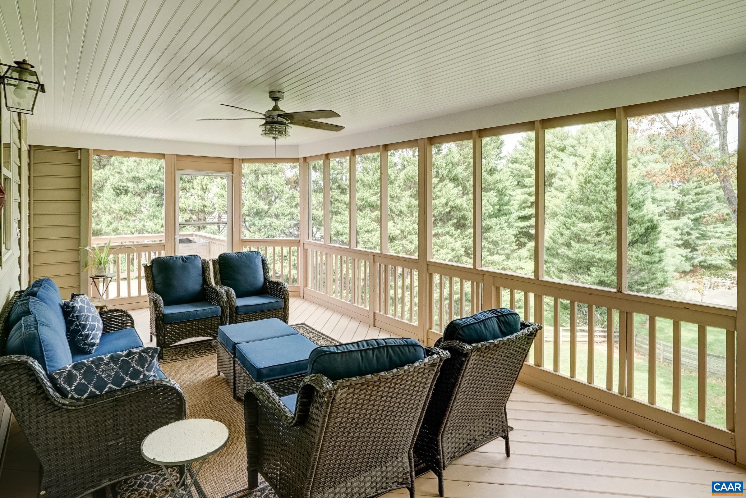 Screened-in porch off of Kitchen Screened-in porch off of Kitchen