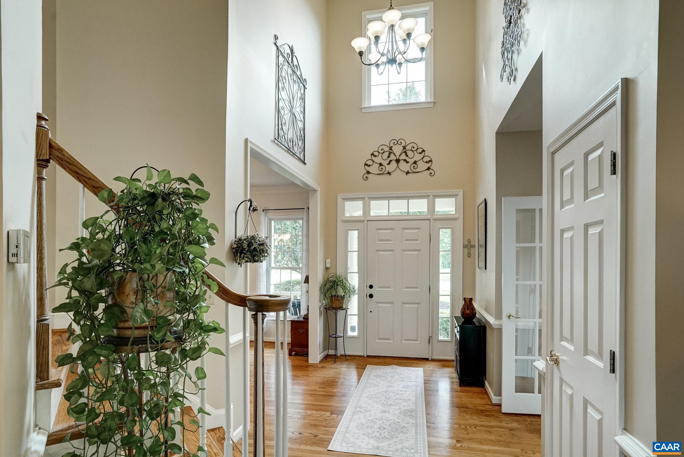 Light filled foyer with vaulted ceilings Light filled foyer with vaulted ceilings