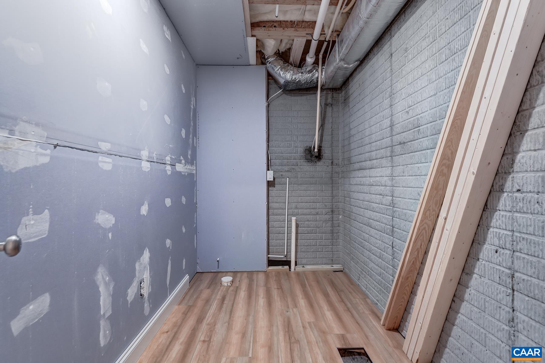 Potential future bathroom - roughed in plumbing. Potential future bathroom - roughed in plumbing.