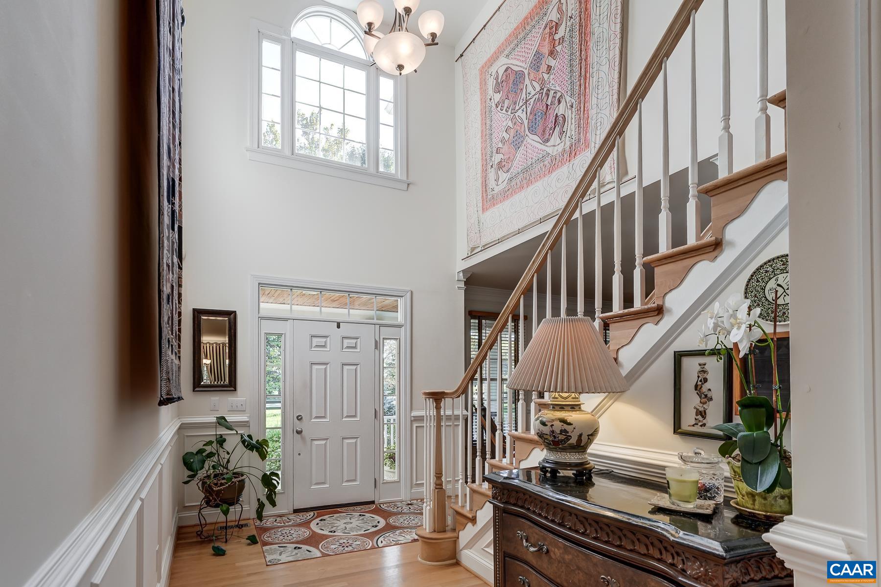 Hardwood floors, light-filled rooms and high-end trim throughout the main level. Hardwood floors, light-filled rooms and high-end trim throughout the main level.