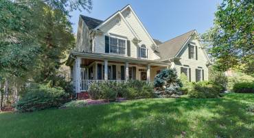 Beautiful custom home with wrap around porch in Ivy!