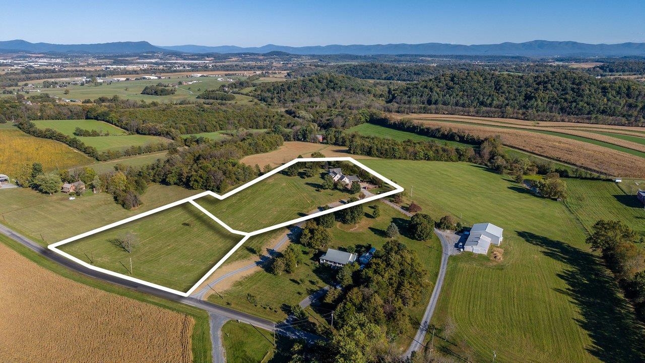This photo shows both the five acre parcel with the house and the additional nearly 3-acre parcel available for purchase separately. This photo shows both the five acre parcel with the house and the additional nearly 3-acre parcel available for purchase separately.