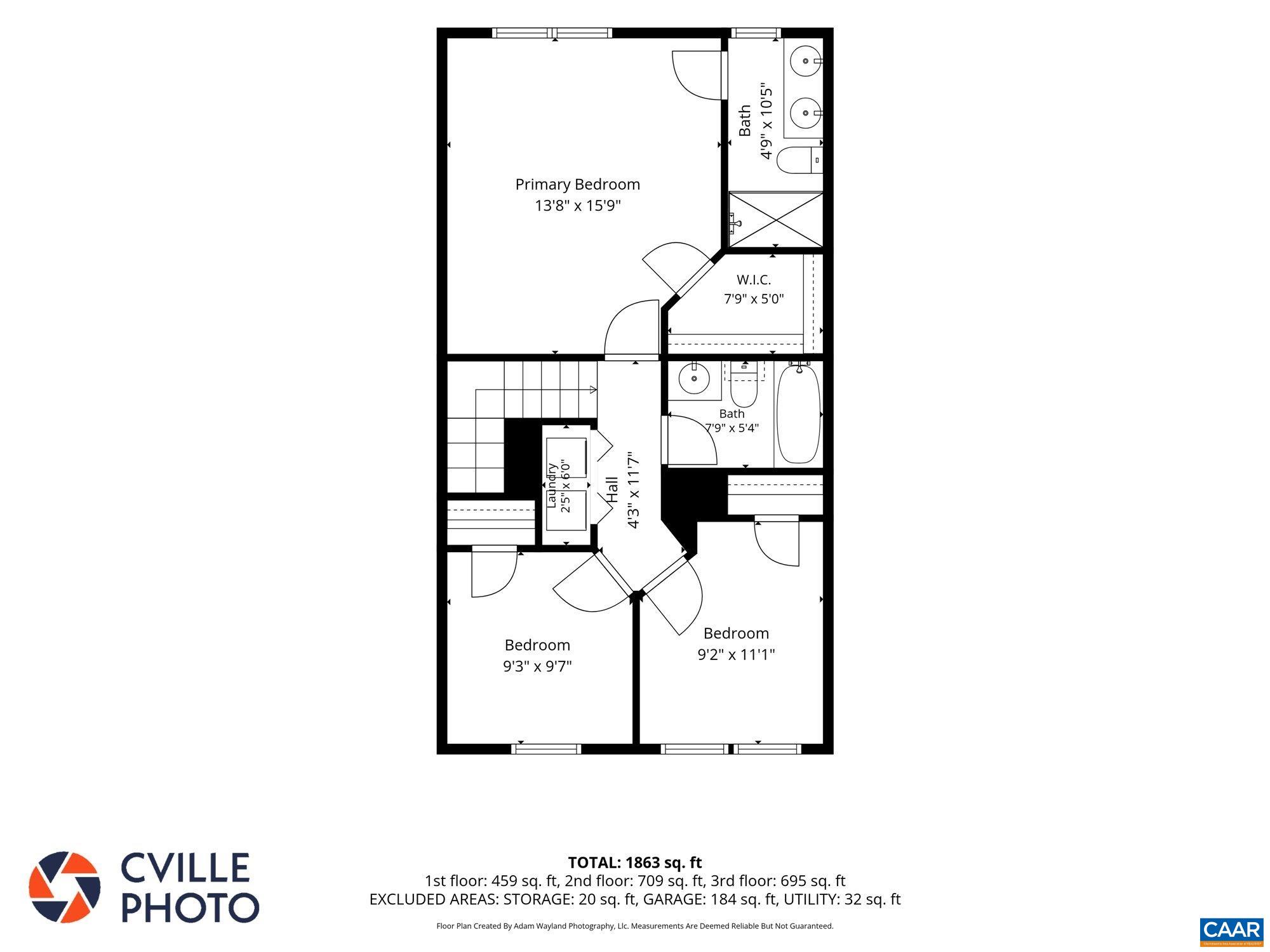 Primary bedroom with ensuite bath, second and third bedrooms, full bath, laundry.