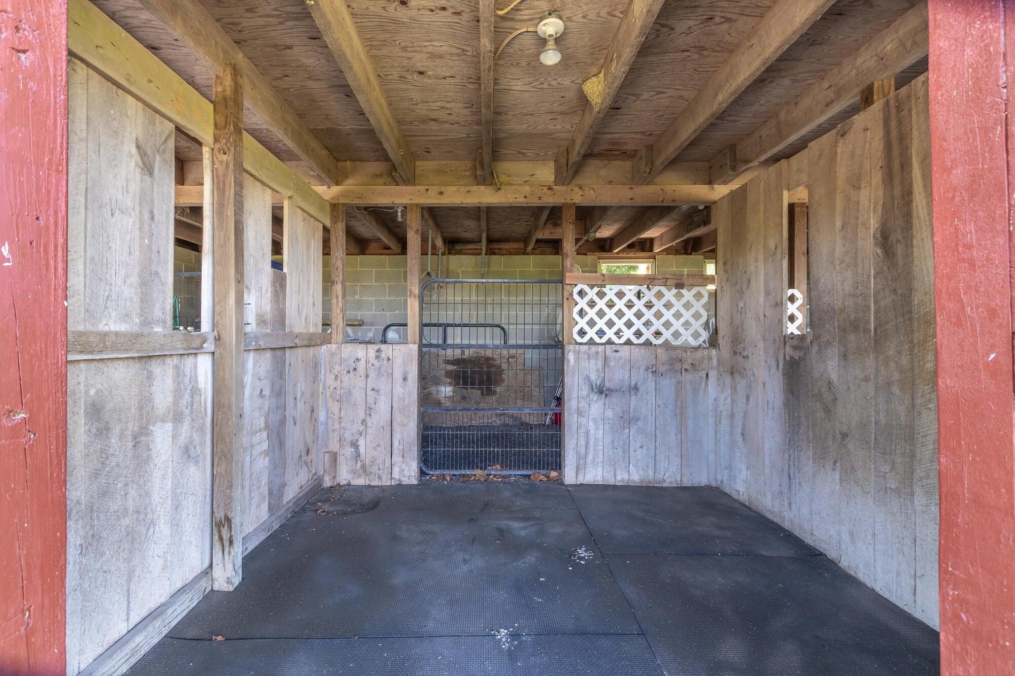 Barn stall with new rubber mats Barn stall with new rubber mats