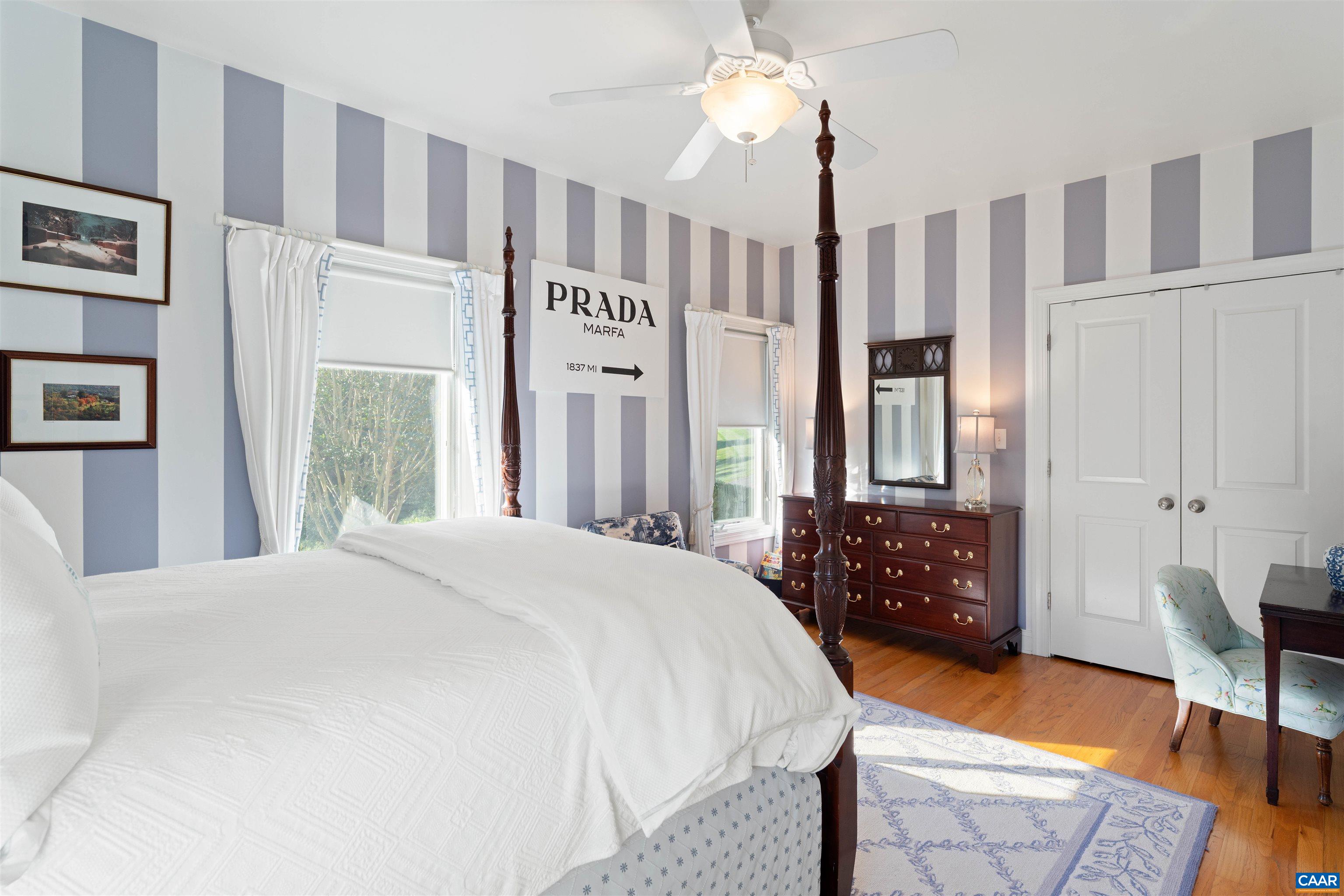 Bedroom with double closet and garden views. Bedroom with double closet and garden views.