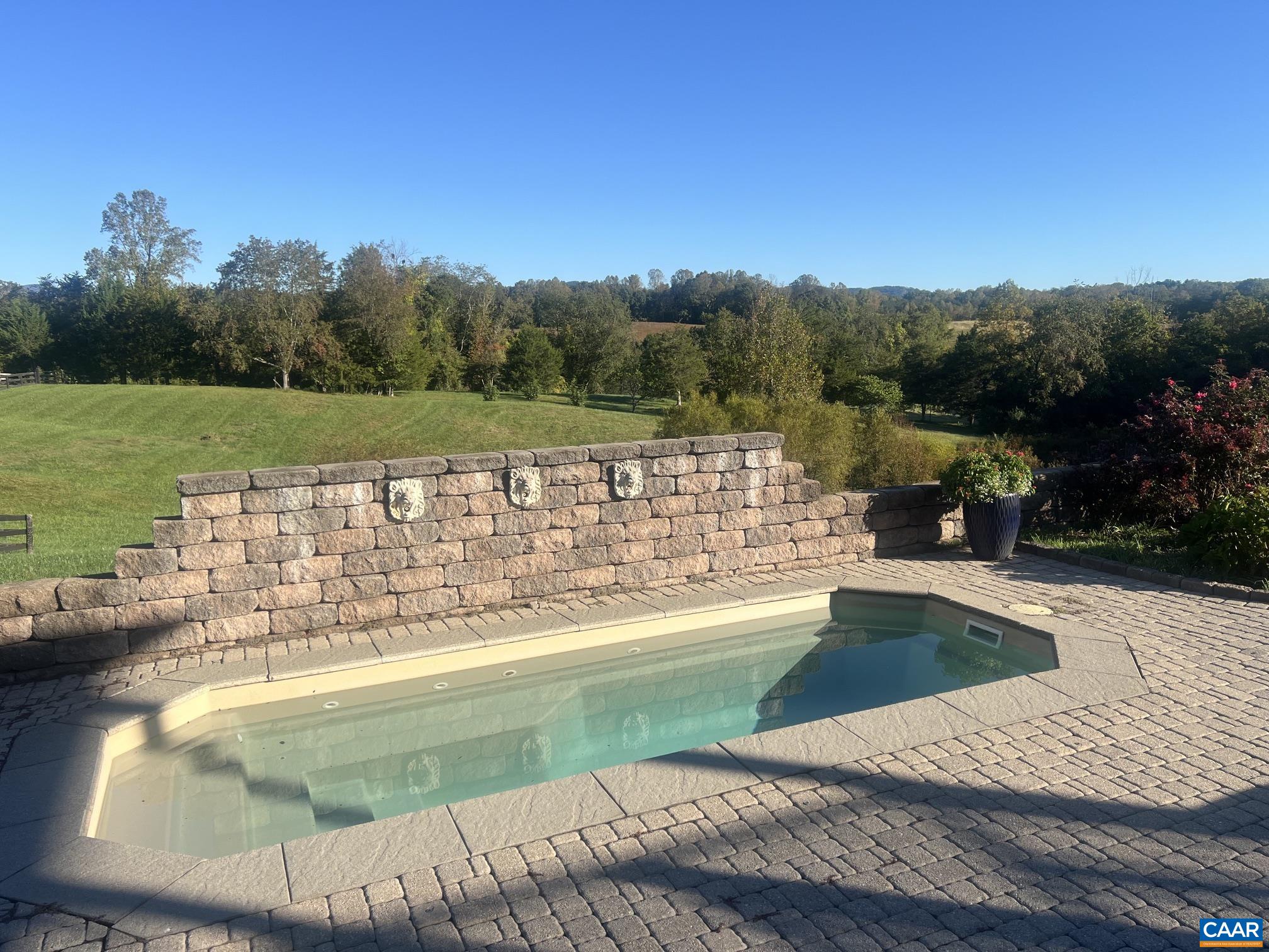 Private plunge pool beside the residence, about 16 by 6 feet, above the paddocks. Private plunge pool beside the residence, about 16 by 6 feet, above the paddocks.