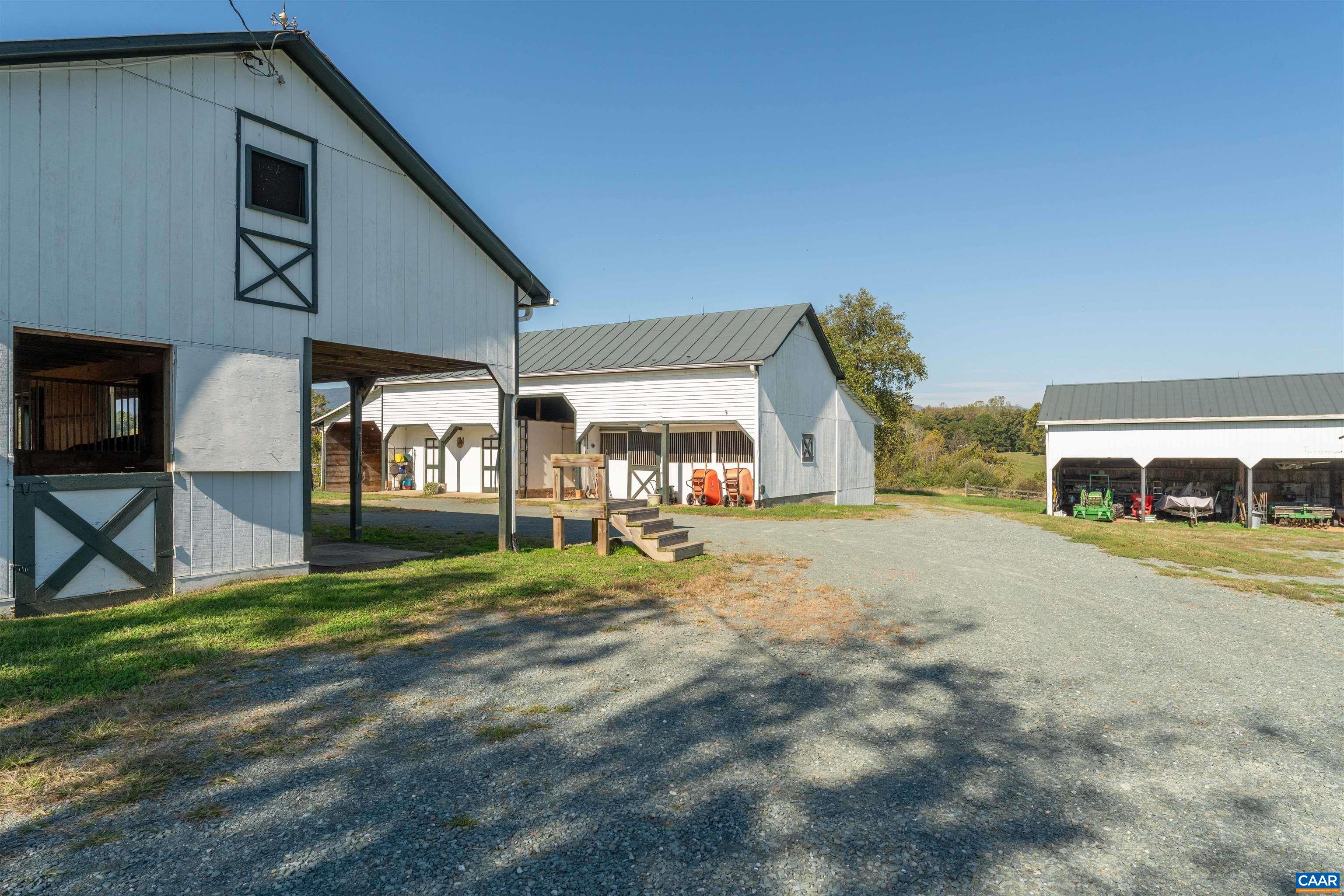 The courtyard between the barns. The older barns were re-sided and repainted in 2024. The courtyard between the barns. The older barns were re-sided and repainted in 2024.