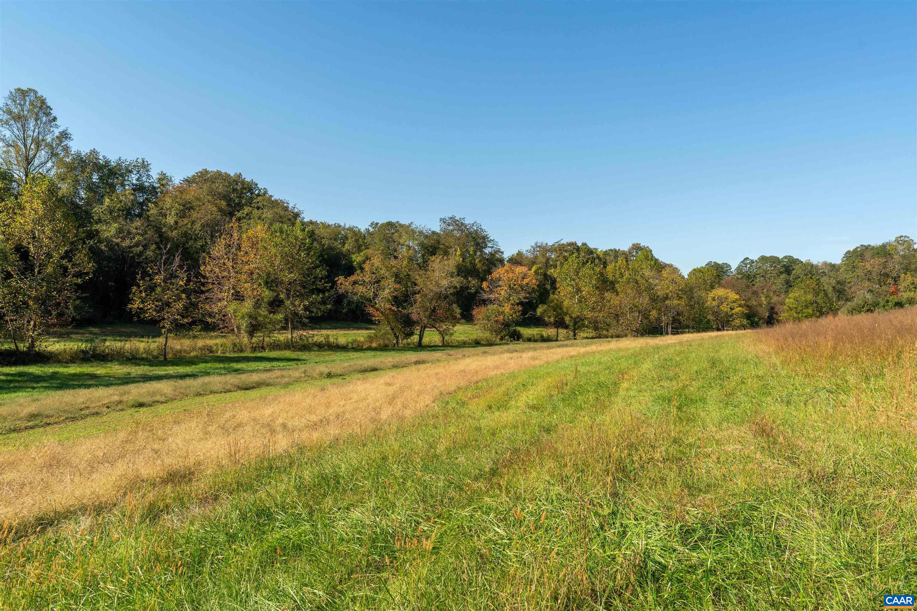 Upper meadow edged by hardwood and mixed woodland. Upper meadow edged by hardwood and mixed woodland.