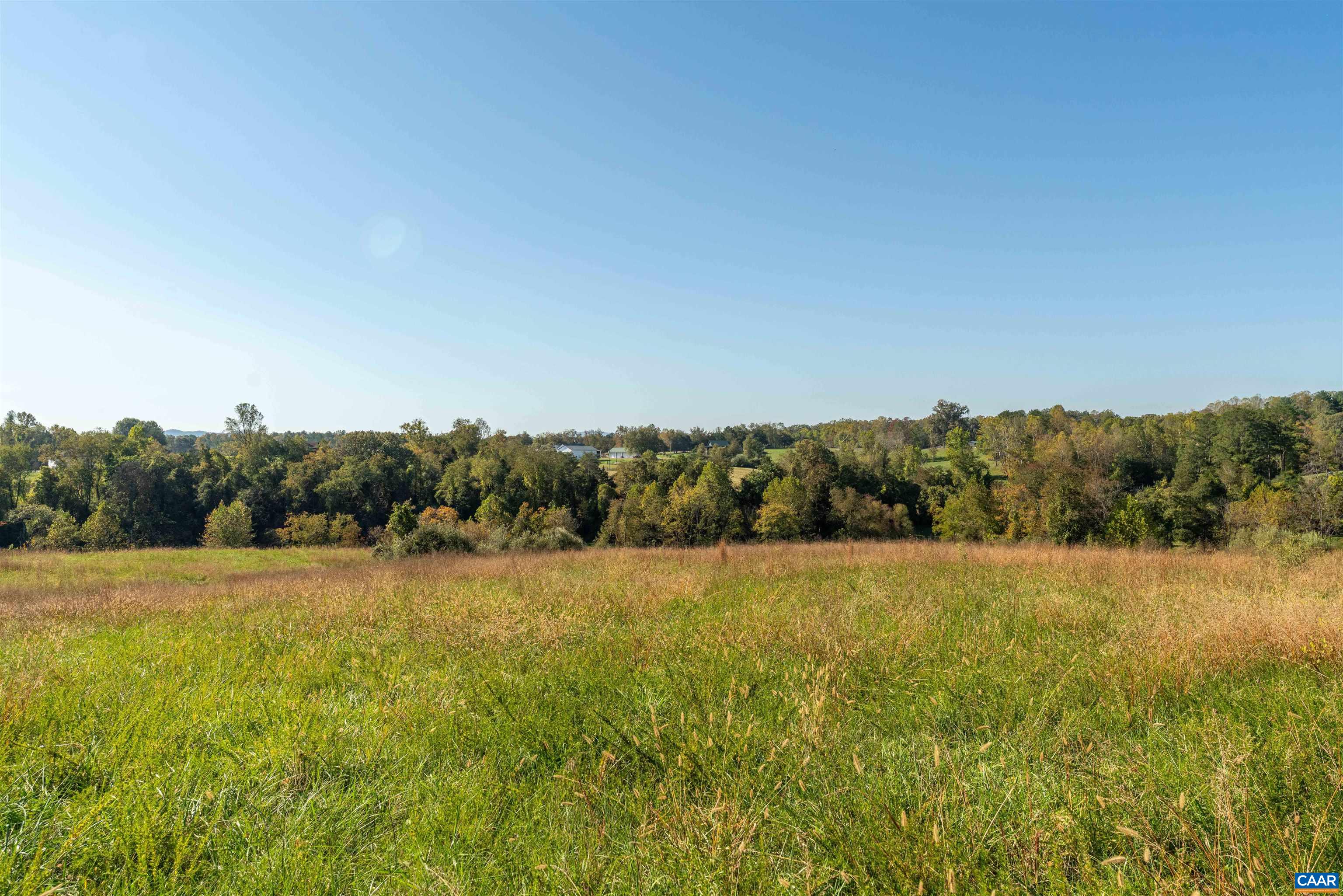 Open meadow with long views across the property. Open meadow with long views across the property.
