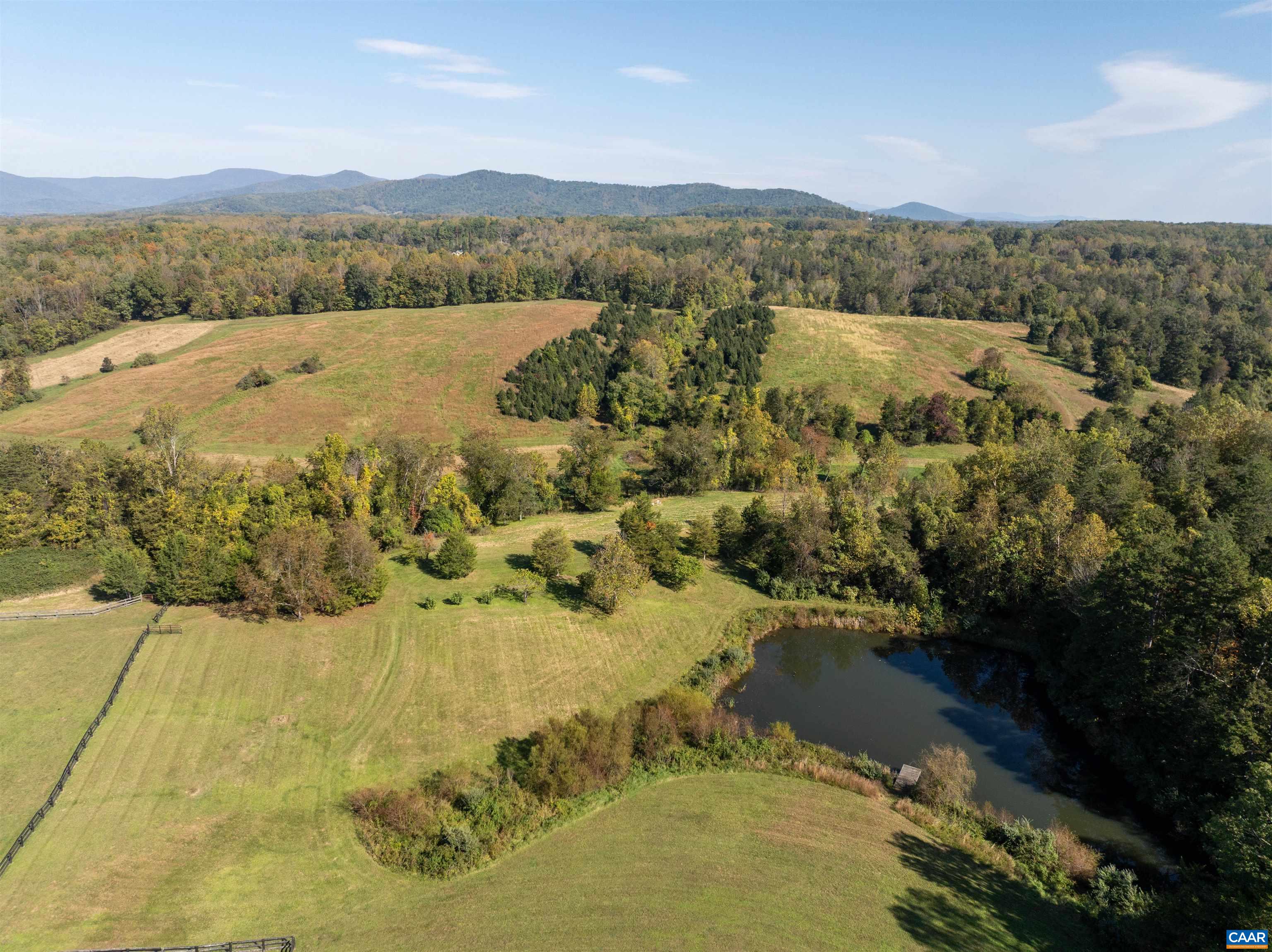 Aerial view of the pond and the lower fields. Aerial view of the pond and the lower fields.