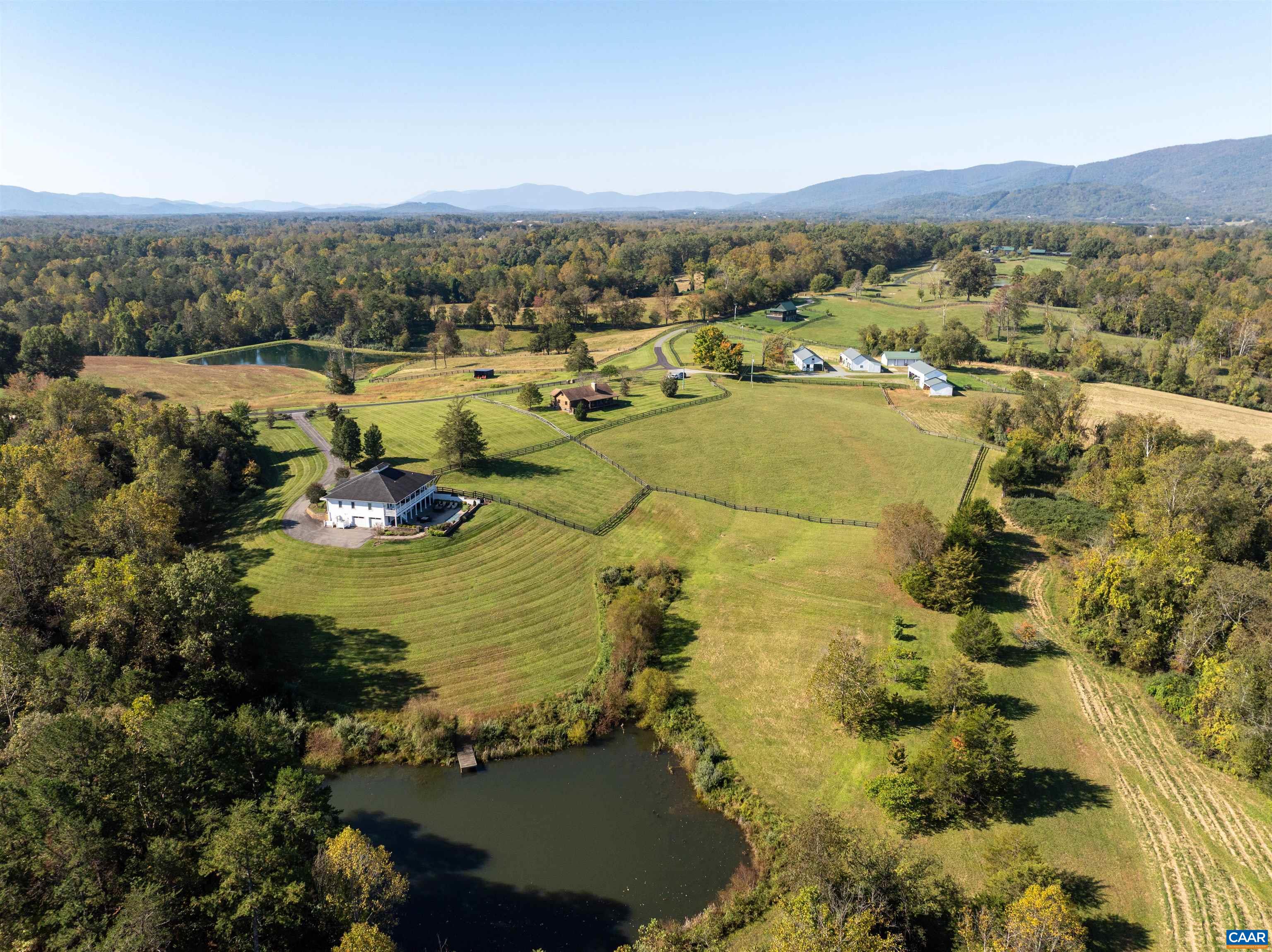 The property from above, from the pond to the barns. The property from above, from the pond to the barns.