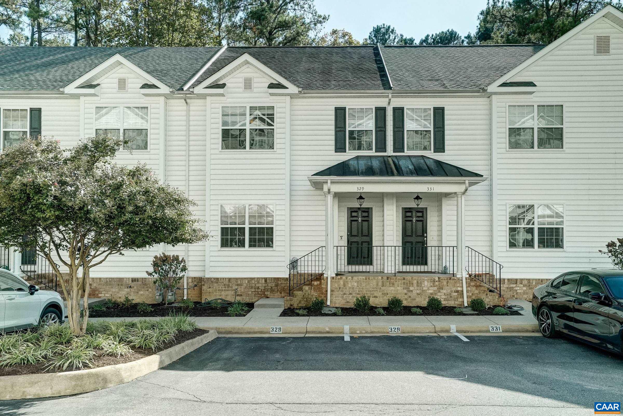2 dedicated parking spots by front door