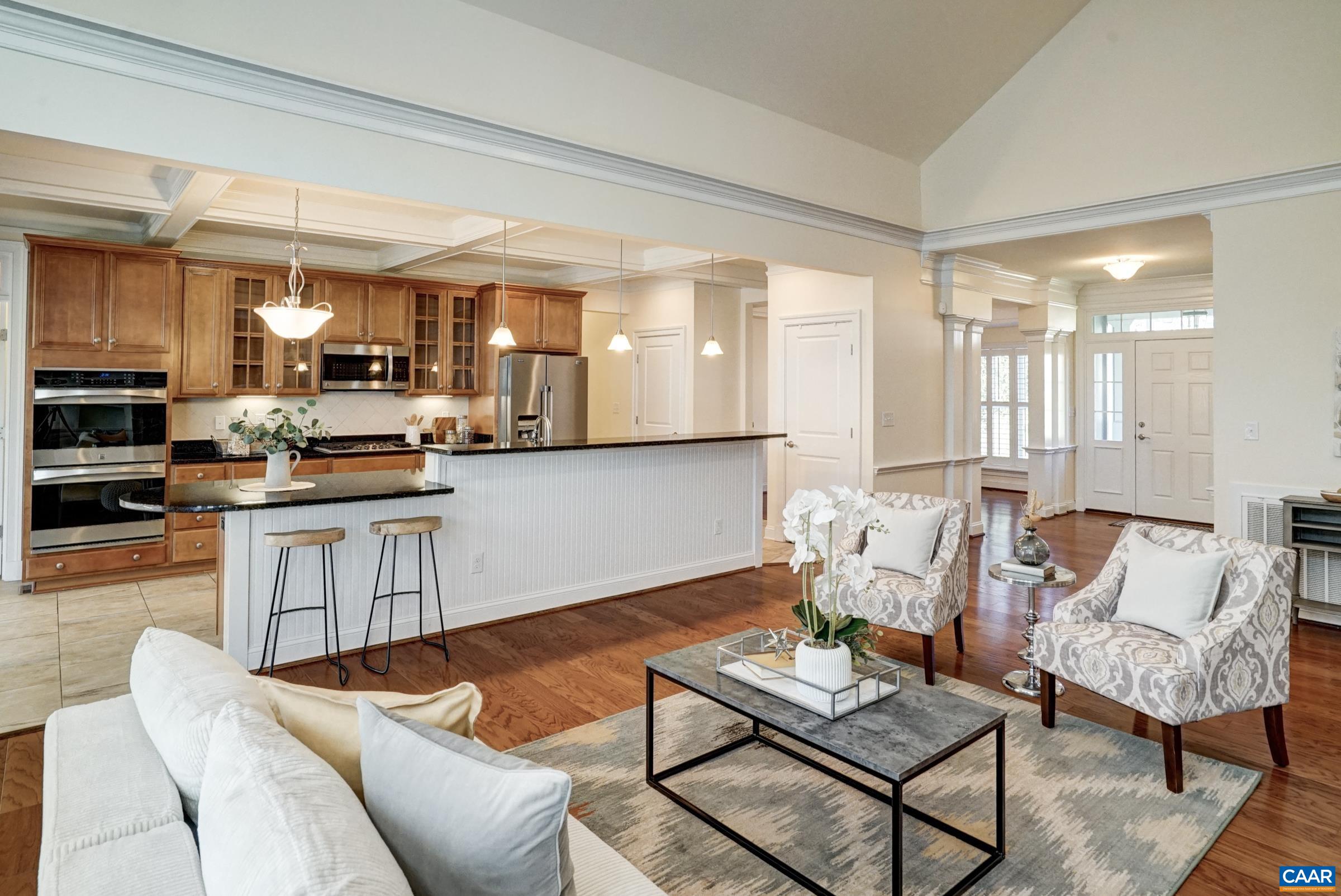Gourmet kitchen features high-low countertop seating. Sit at the breakfast bar or gather at the lower penninsula for a casual meal. Gourmet kitchen features high-low countertop seating. Sit at the breakfast bar or gather at the lower penninsula for a casual meal.