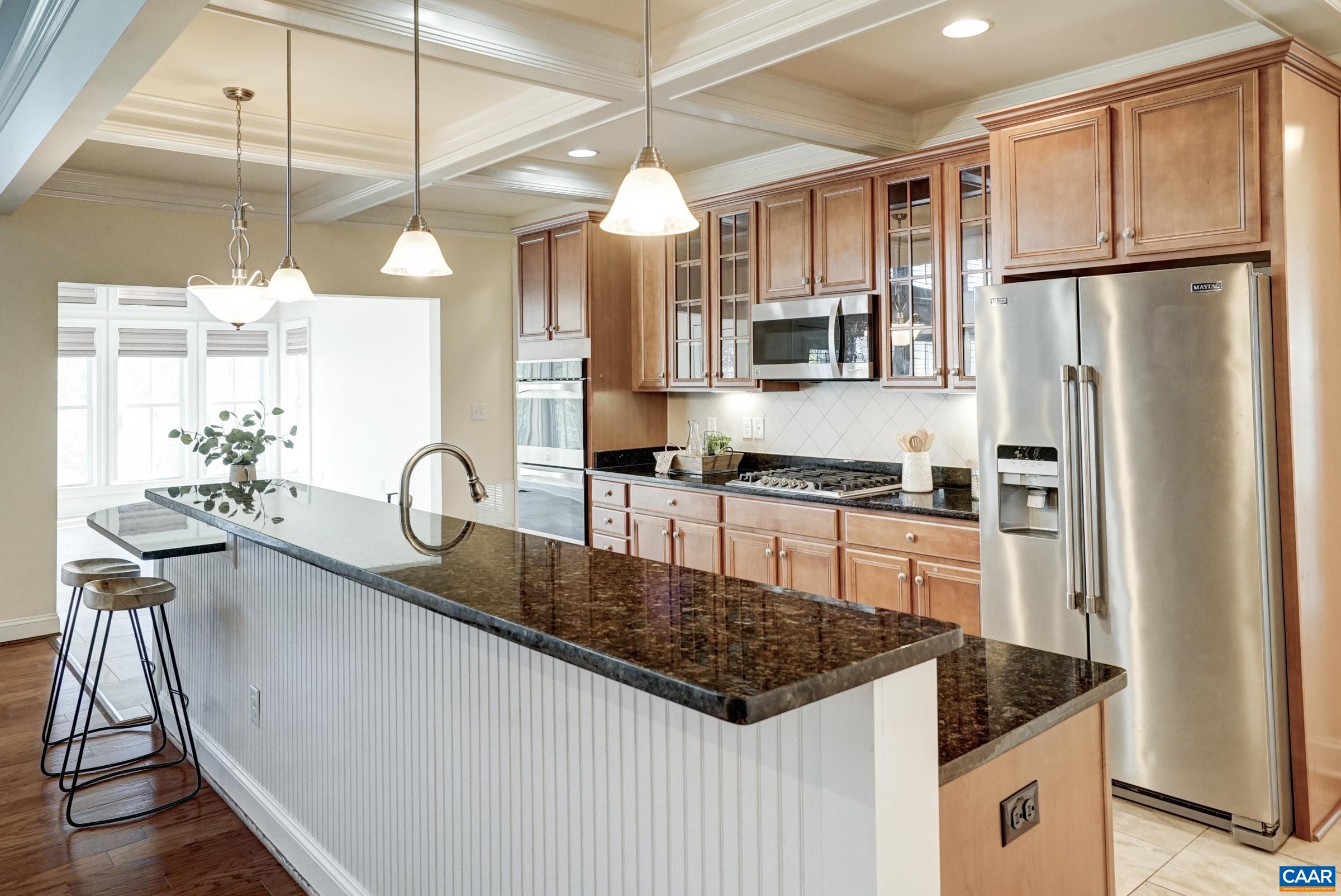 Granite countertops and maple cabinets. Granite countertops and maple cabinets.