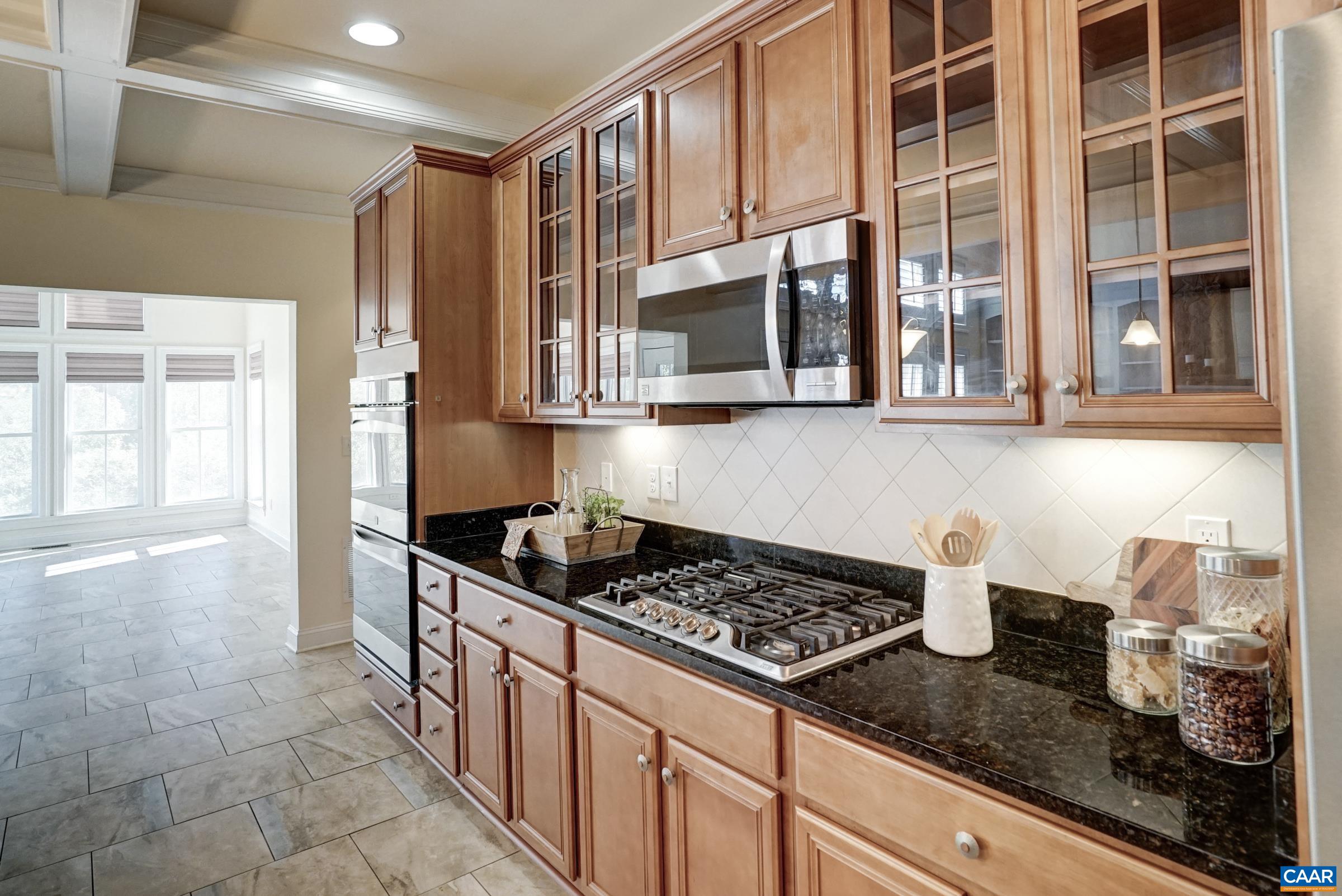 Gas cooktop and wall oven. Gas cooktop and wall oven.