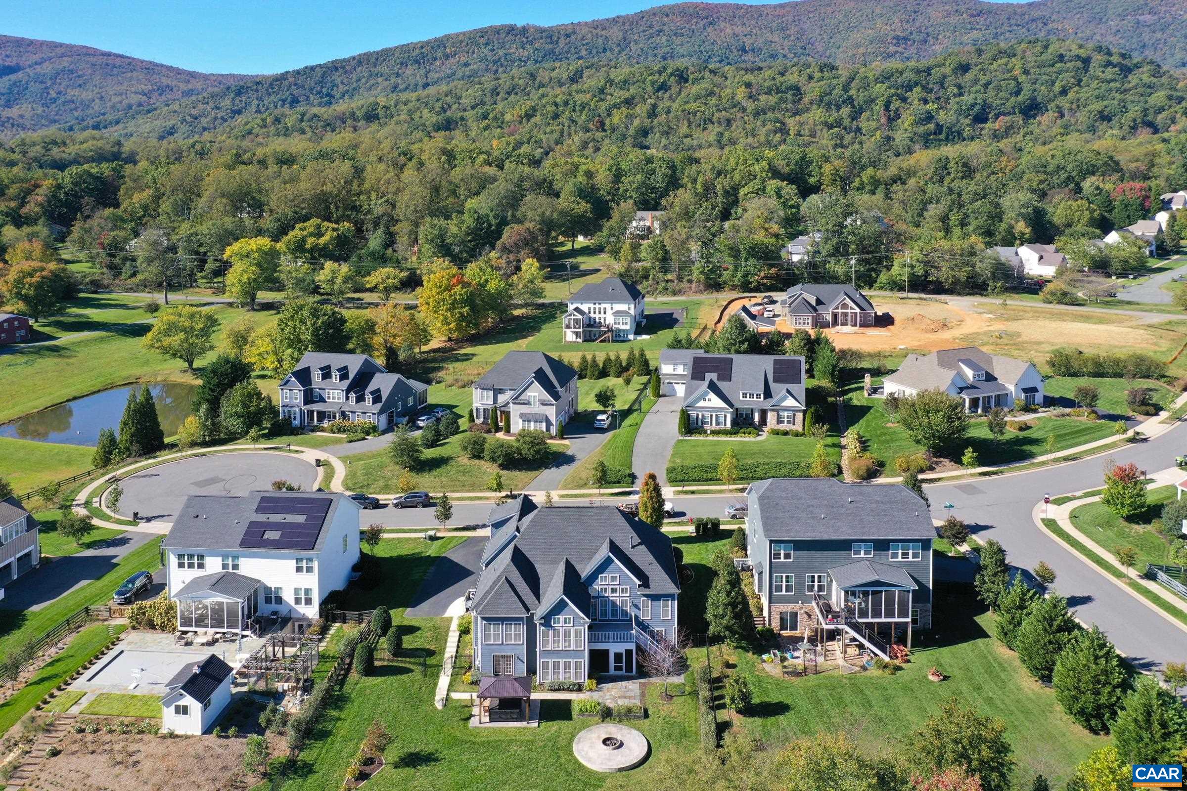 Flat fenced yard with room to run, plus a fire pit and hot tub with pergola. Flat fenced yard with room to run, plus a fire pit and hot tub with pergola.