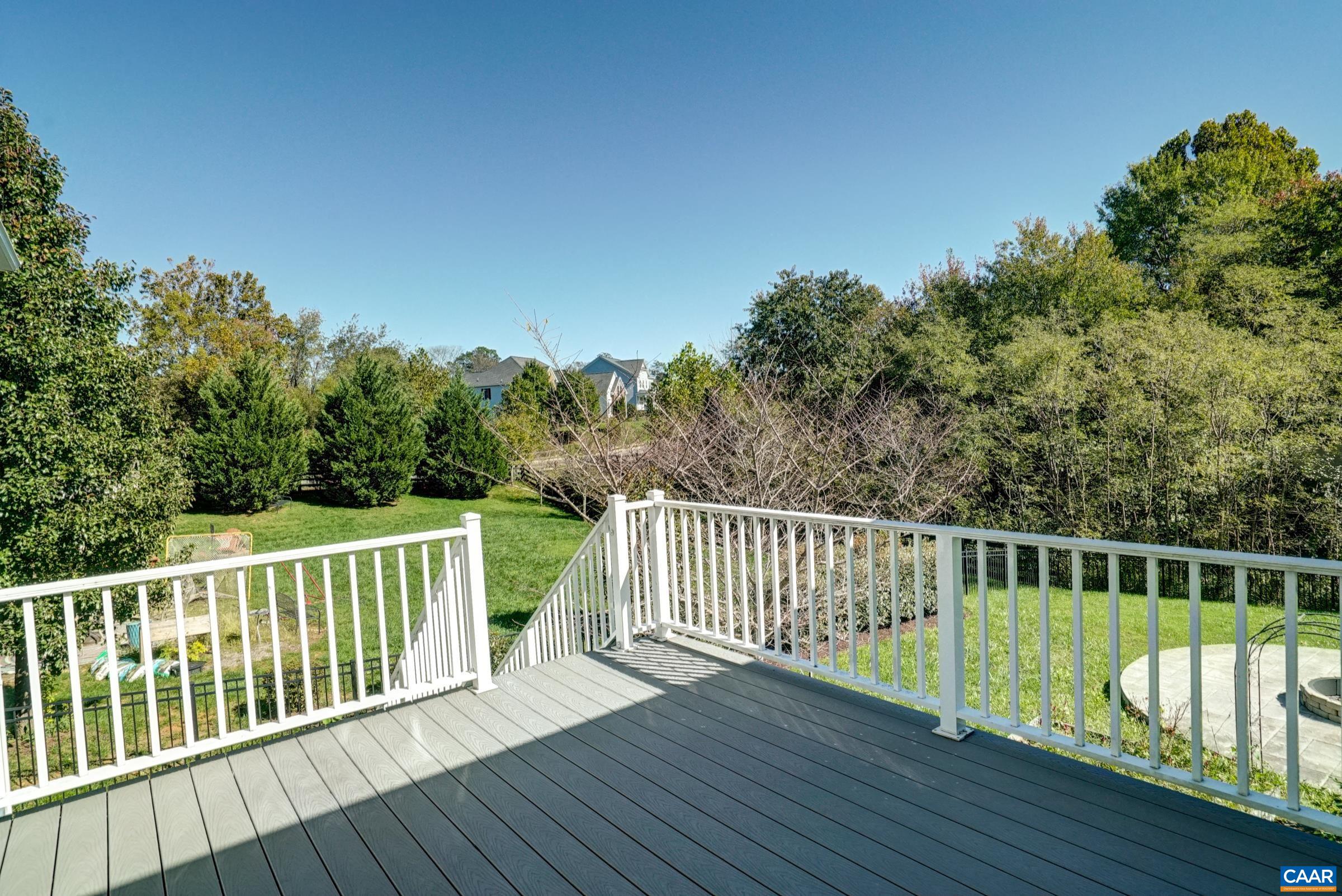 Composite deck overlooks private back yard. Composite deck overlooks private back yard.