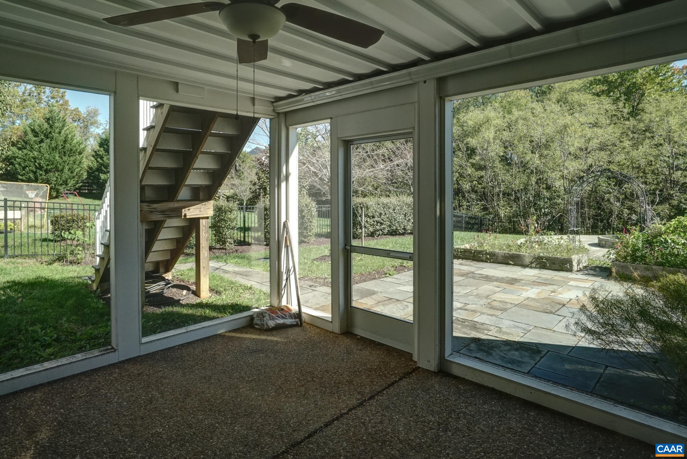 Screened porch with patio accesss. Screened porch with patio accesss.