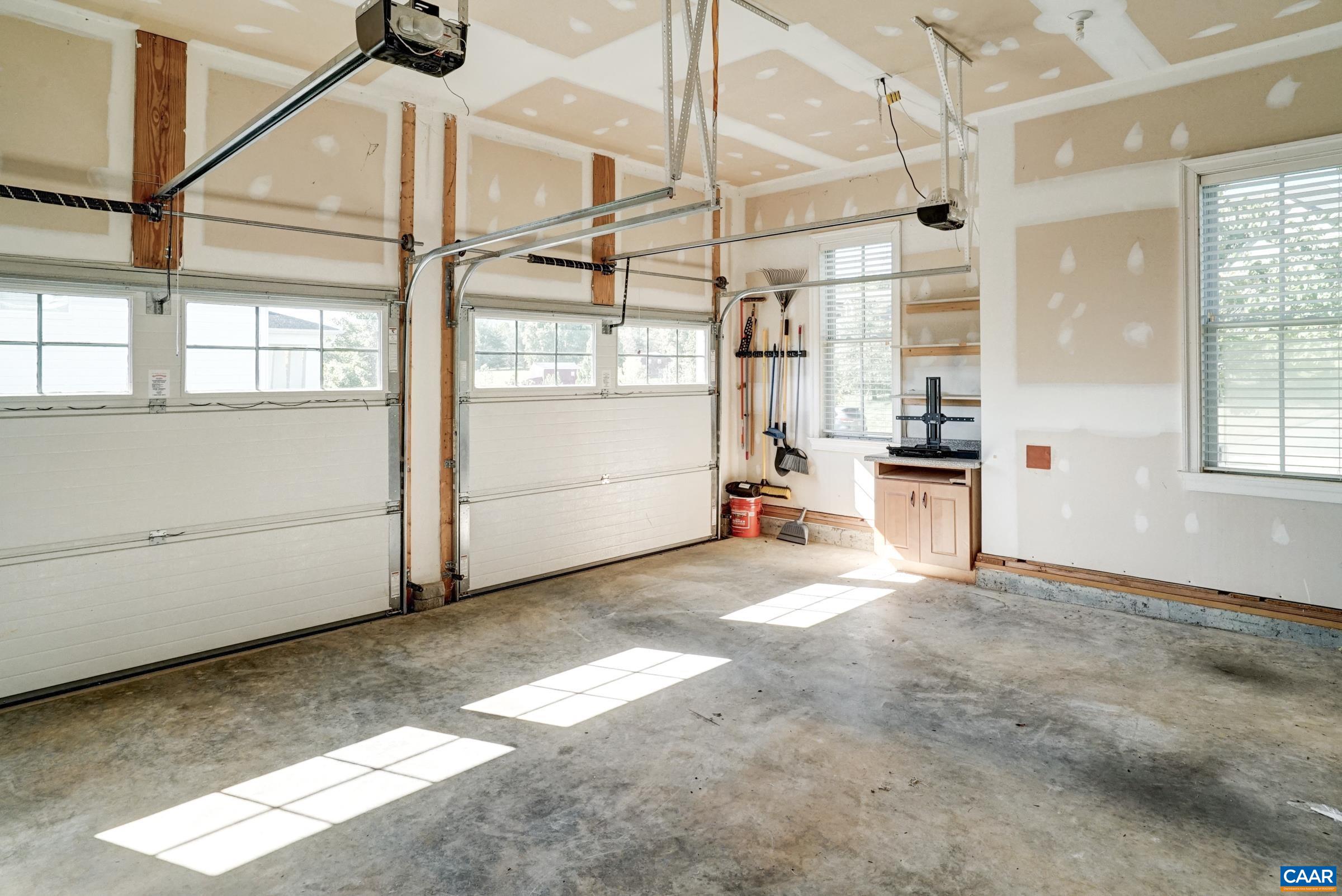 Oversized 2 car garage with storage. Oversized 2 car garage with storage.
