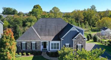 One level living on a half acre lot with incredible Blue Ridge views!