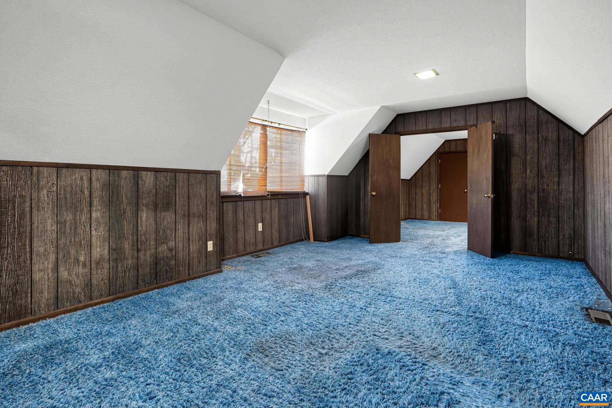 Paneled Bedroom/Bonus room with Sitting Room. Paneled Bedroom/Bonus room with Sitting Room.