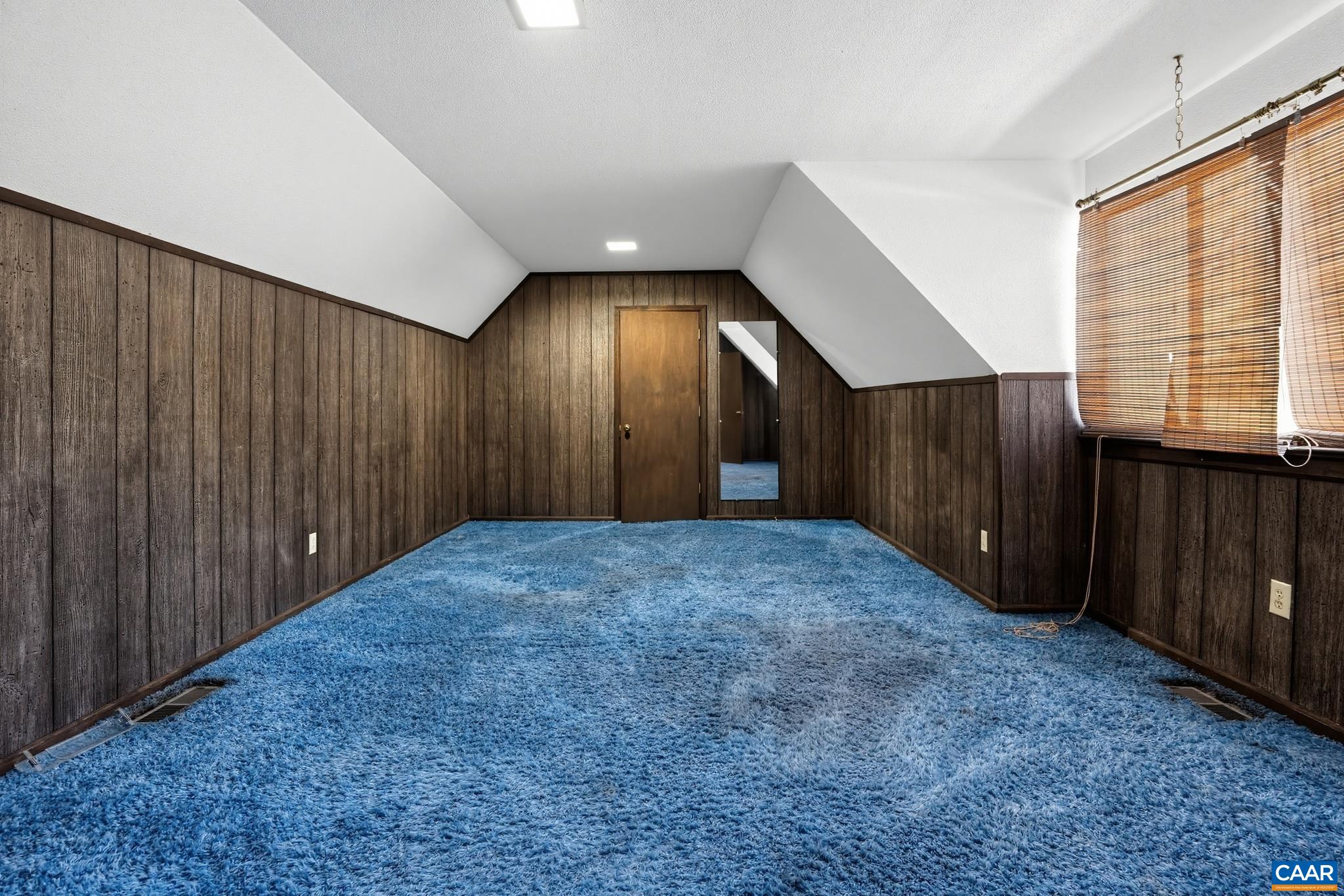 Paneled Bedroom/Bonus room with Sitting Room. Paneled Bedroom/Bonus room with Sitting Room.