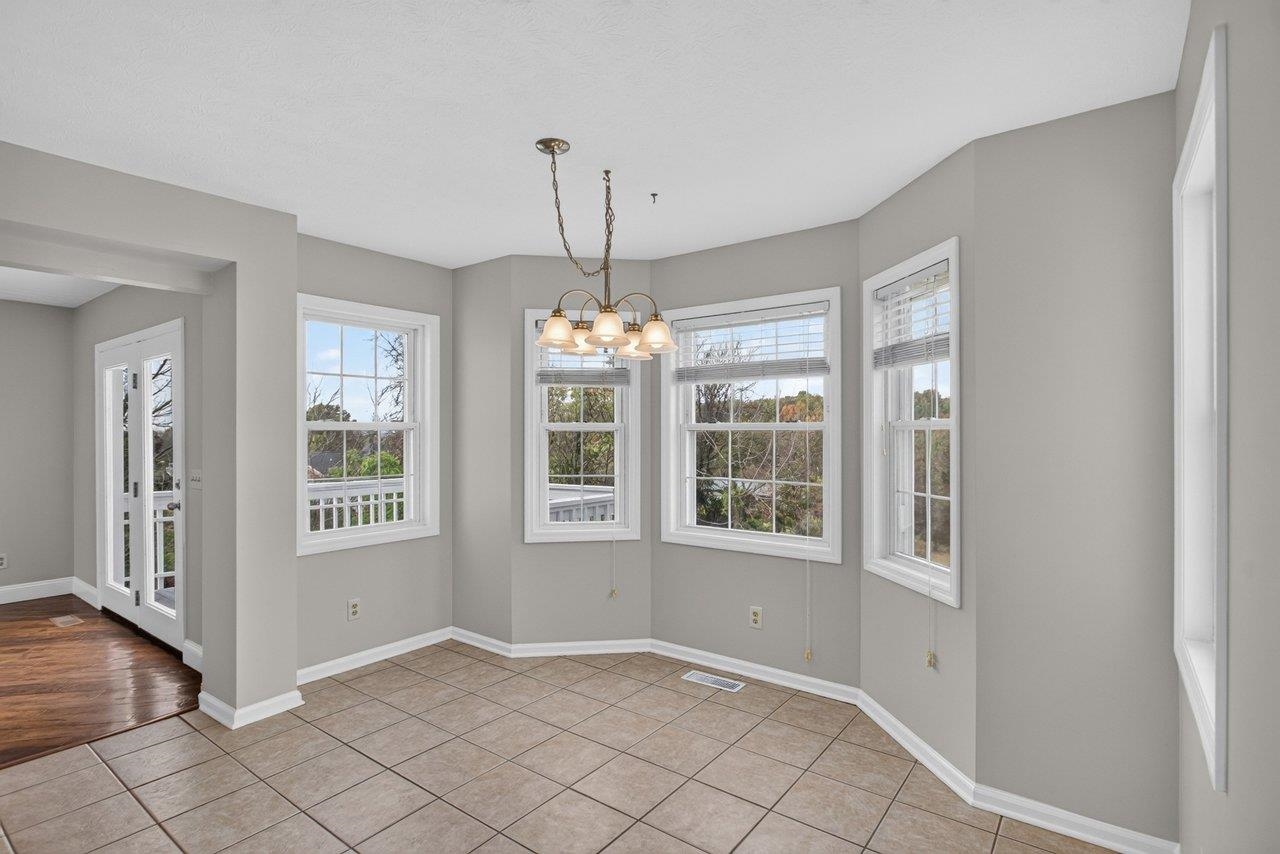 Enjoy meals at the kitchen table while taking in views of the spacious backyard with no homes directly behind you.