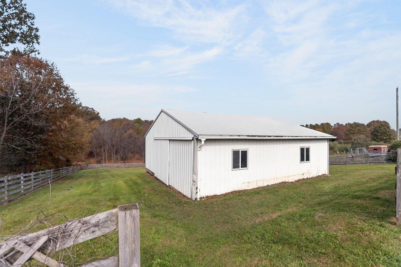 This building has been used in the past as a horse barn (stalls removed), and a workshop. The possibilities are unlimited.