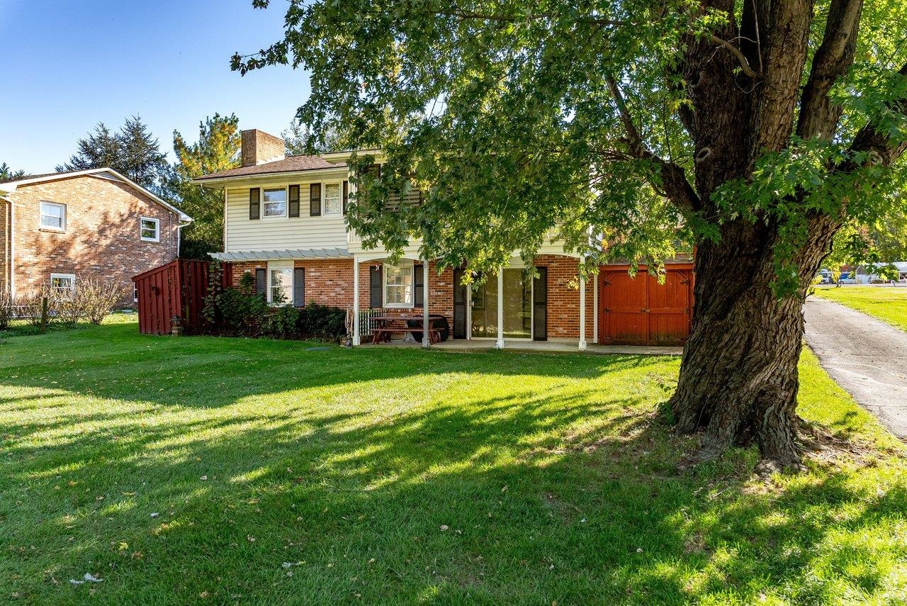 The large backyard offers plenty of room for gardening, playtime, or letting pets roam and enjoy the outdoors.