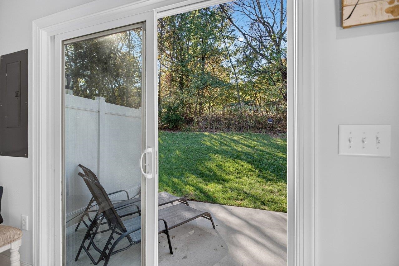A patio just off the dining room provides easy access to outdoor living and entertaining.