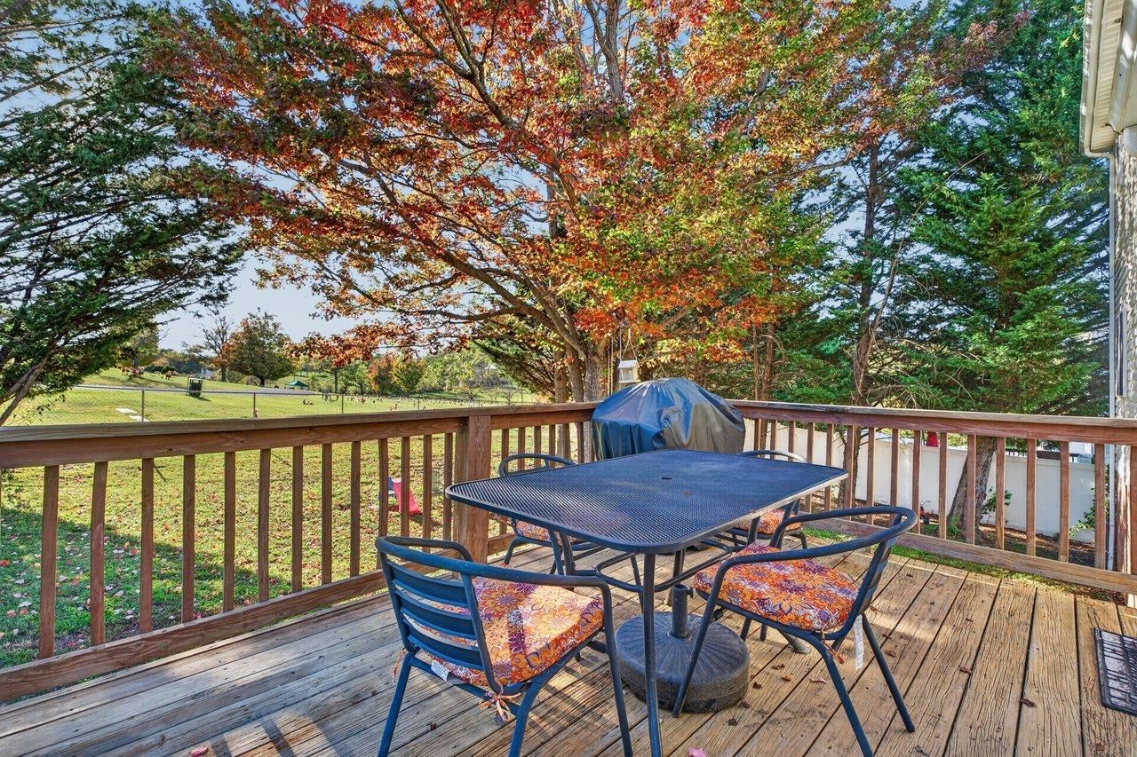 The deck is a great spot to relax while the kids play, entertain family and friends, or keep an eye on the pets in the fenced backyard.